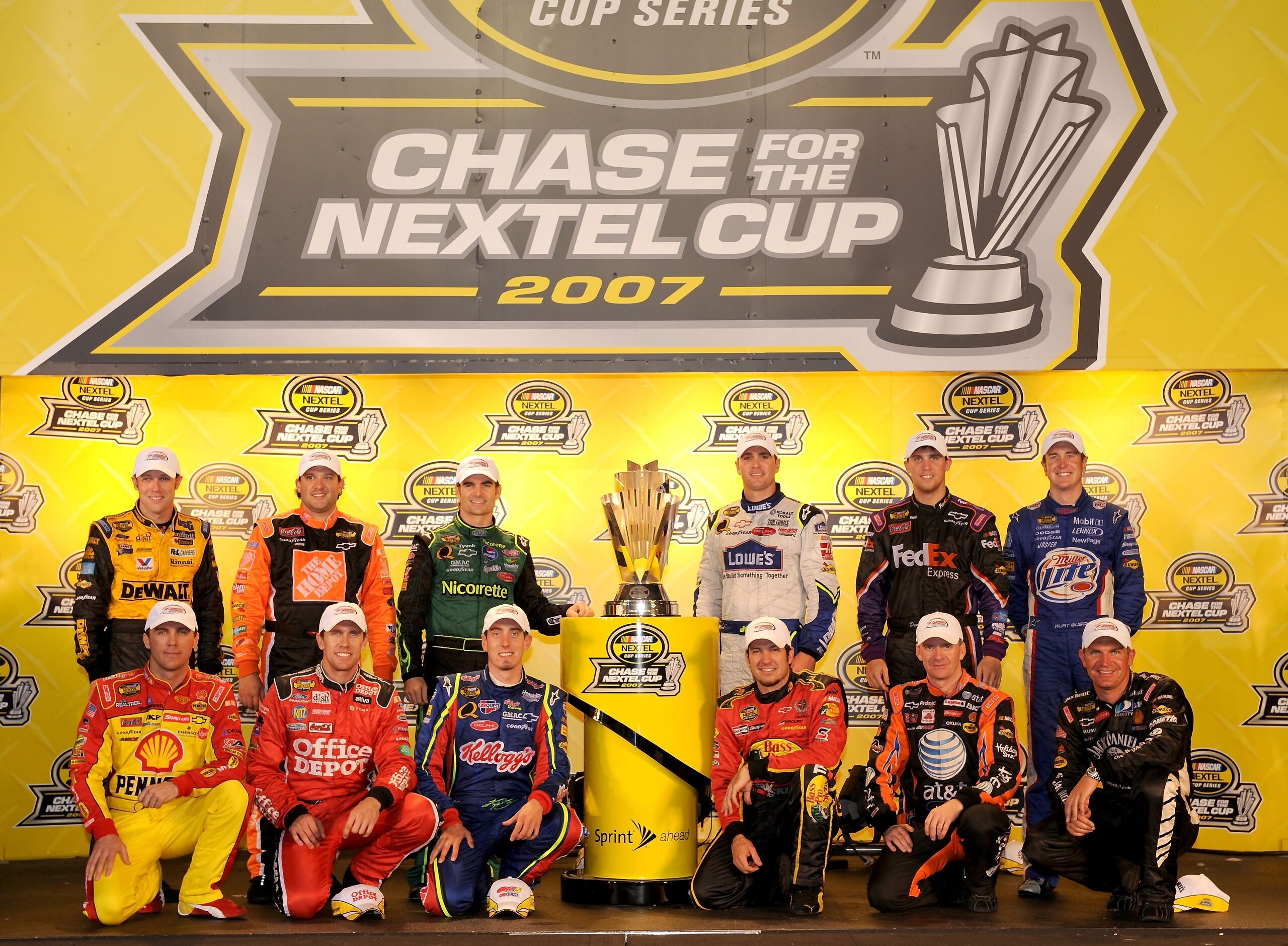 RICHMOND, VA - SEPTEMBER 08:  (L-R back to front) Nextel Cup Series drivers Matt Kenseth, Tony Stewart, Jeff Gordon, Jimmie Johnson, Denny Hamlin, Kurt Busch, Kevin Harvick, Carl Edwards, Kyle Busch, Martin Truex Jr., Jeff Burton and Clint Bowyer pose for
