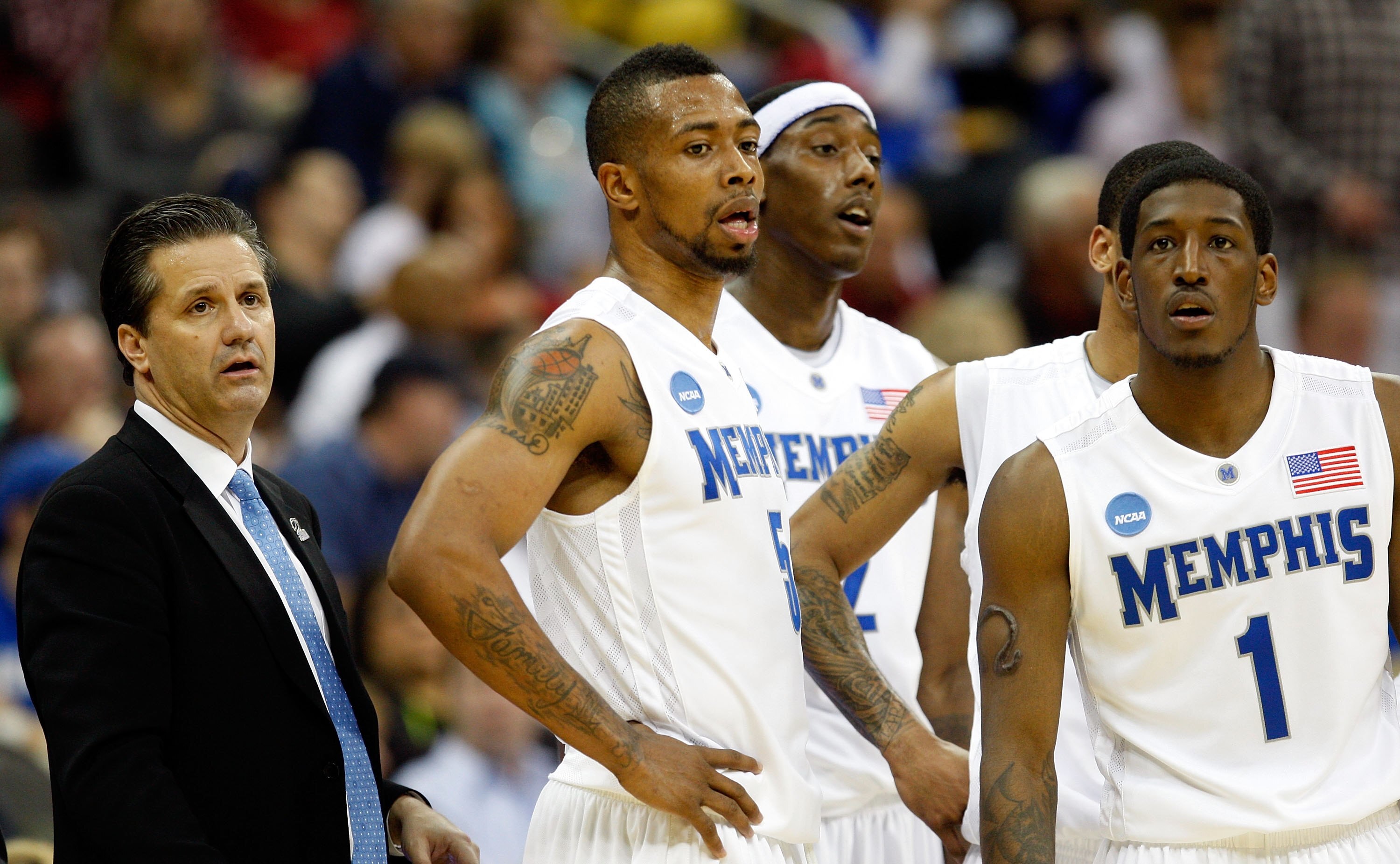 KANSAS CITY, MO - MARCH 21: Head Coach John Calipari, Antonio Anderson #5, Robert Dozier #2 and Willie Kemp #1 of the Memphis Tigers look on from the bench area during their second round game against the Maryland Terrapins in the NCAA Division I Men's Ba KANSAS CITY, MO - MARCH 21: Head Coach John Calipari, Antonio Anderson #5, Robert Dozier #2 and Willie Kemp #1 of the Memphis Tigers look on from the bench area during their second round game against the Maryland Terrapins in the NCAA Division I Men's Ba