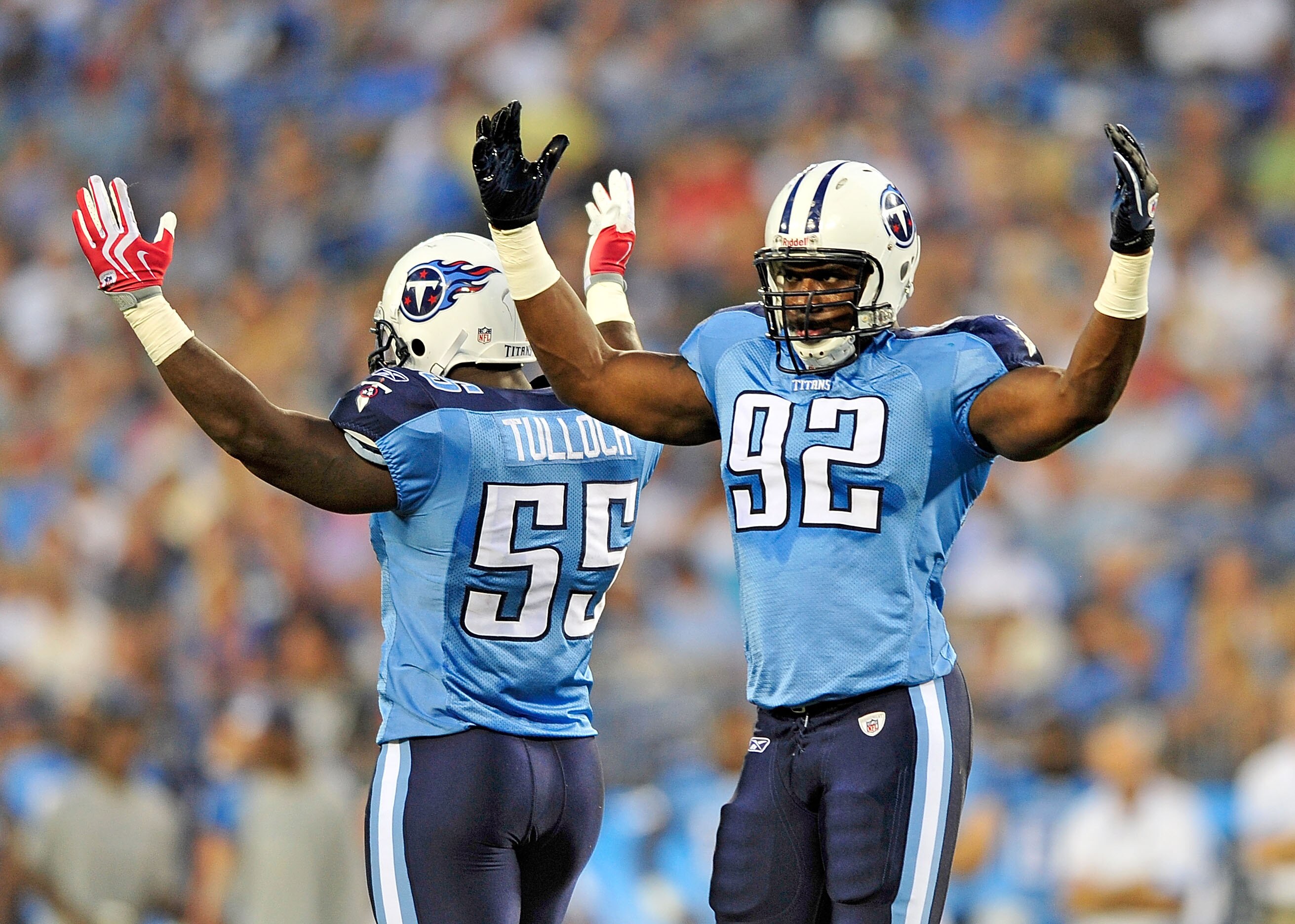 NASHVILLE, TN - SEPTEMBER 02:  Stephen Tulloch #55 and Will Witherspoon #92 of the Tennessee Titans amp up the crowd during an exhibition game against the New Orleans Saints at LP Field on September 2, 2010 in Nashville, Tennessee.  (Photo by Grant Halver