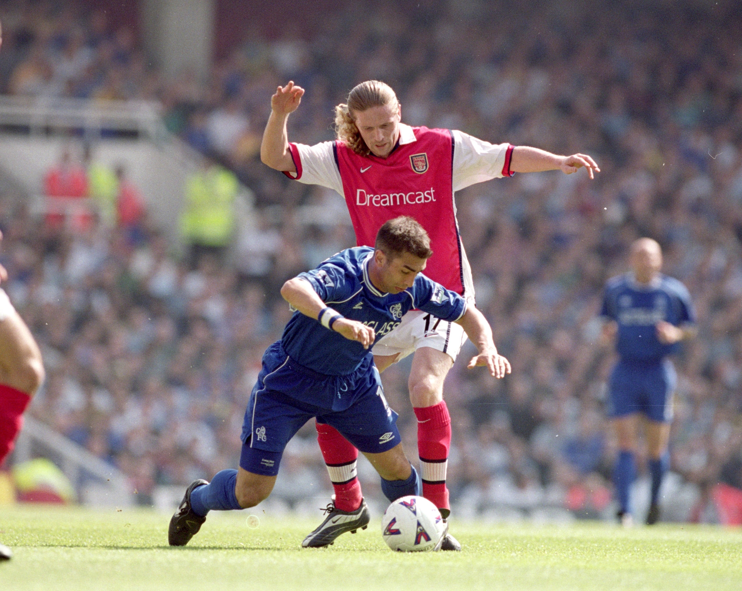 6 May 2000:  Emmanuel Petit of Arsenal (standing) challenges Roberto Di Matteo of Chelsea during the FA Carling Premiership game at Highbury in London, England. Arsenal won 2 - 1. \ Mandatory Credit: Ben Radford /Allsport