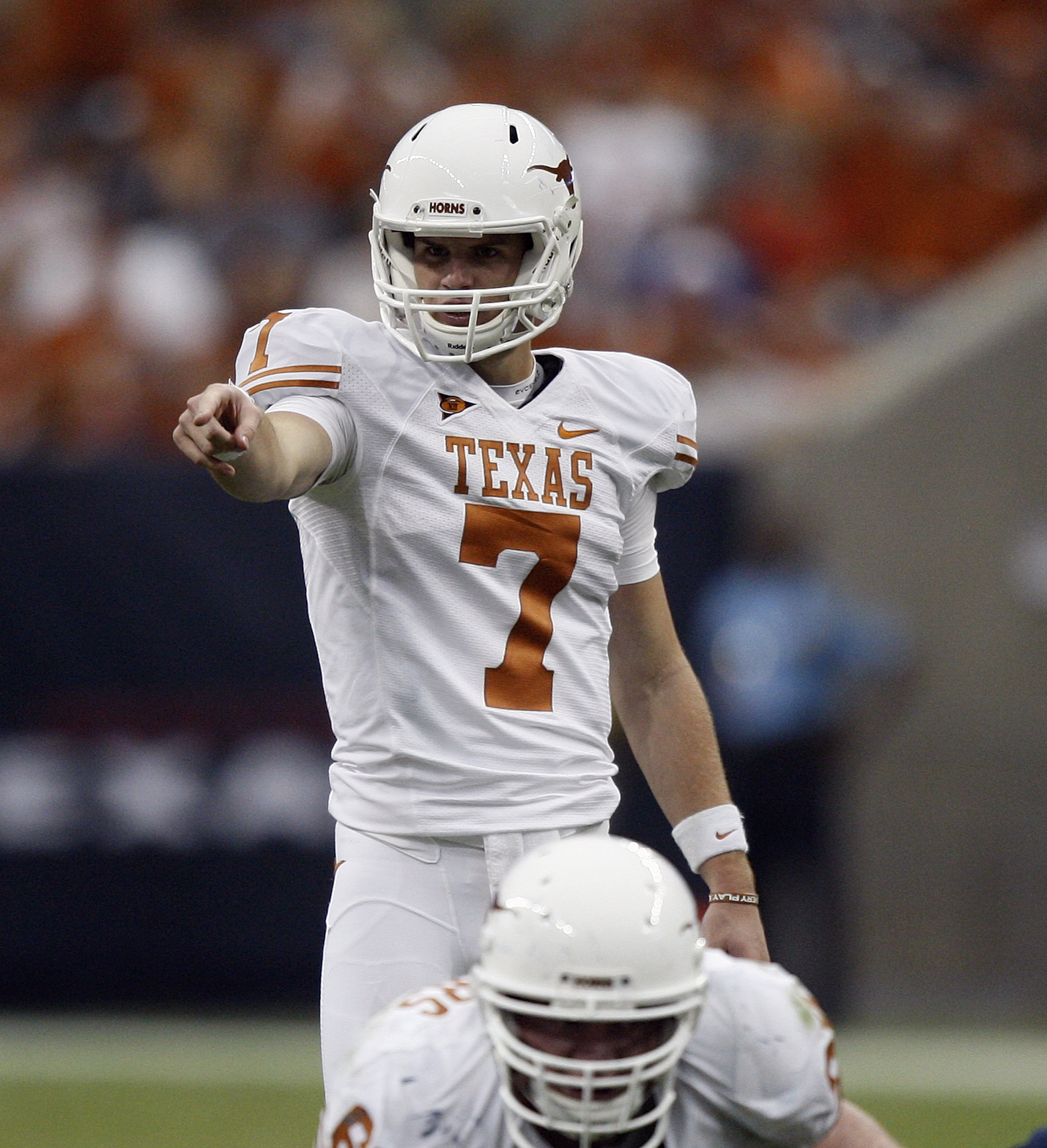 HOUSTON - SEPTEMBER 04: Quarterback Garrett Gilbert #7 of the Texas Longhorns during game action against the Rice Owls at Reliant Stadium on September 4, 2010 in Houston, Texas. Texas won 34-17. (Photo by Bob Levey/Getty Images) HOUSTON - SEPTEMBER 04: Quarterback Garrett Gilbert #7 of the Texas Longhorns during game action against the Rice Owls at Reliant Stadium on September 4, 2010 in Houston, Texas. Texas won 34-17. (Photo by Bob Levey/Getty Images)