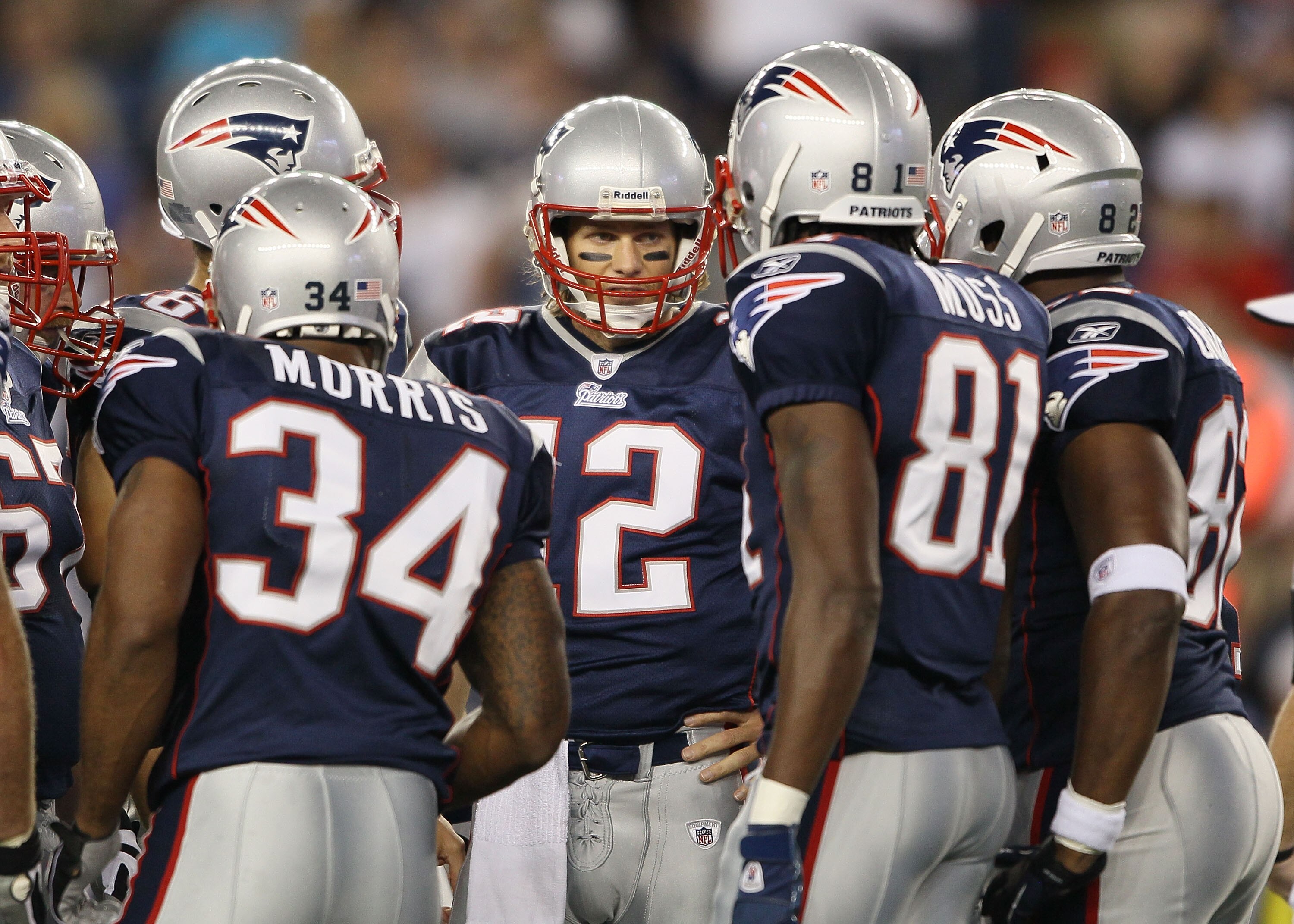 FOXBORO, MA - AUGUST 26:  Tom Brady #12 of the New England Patriots talks in the huddle in the first half against the St. Louis Rams on August 26, 2010 at Gillette Stadium in Foxboro, Massachusetts.  (Photo by Elsa/Getty Images)