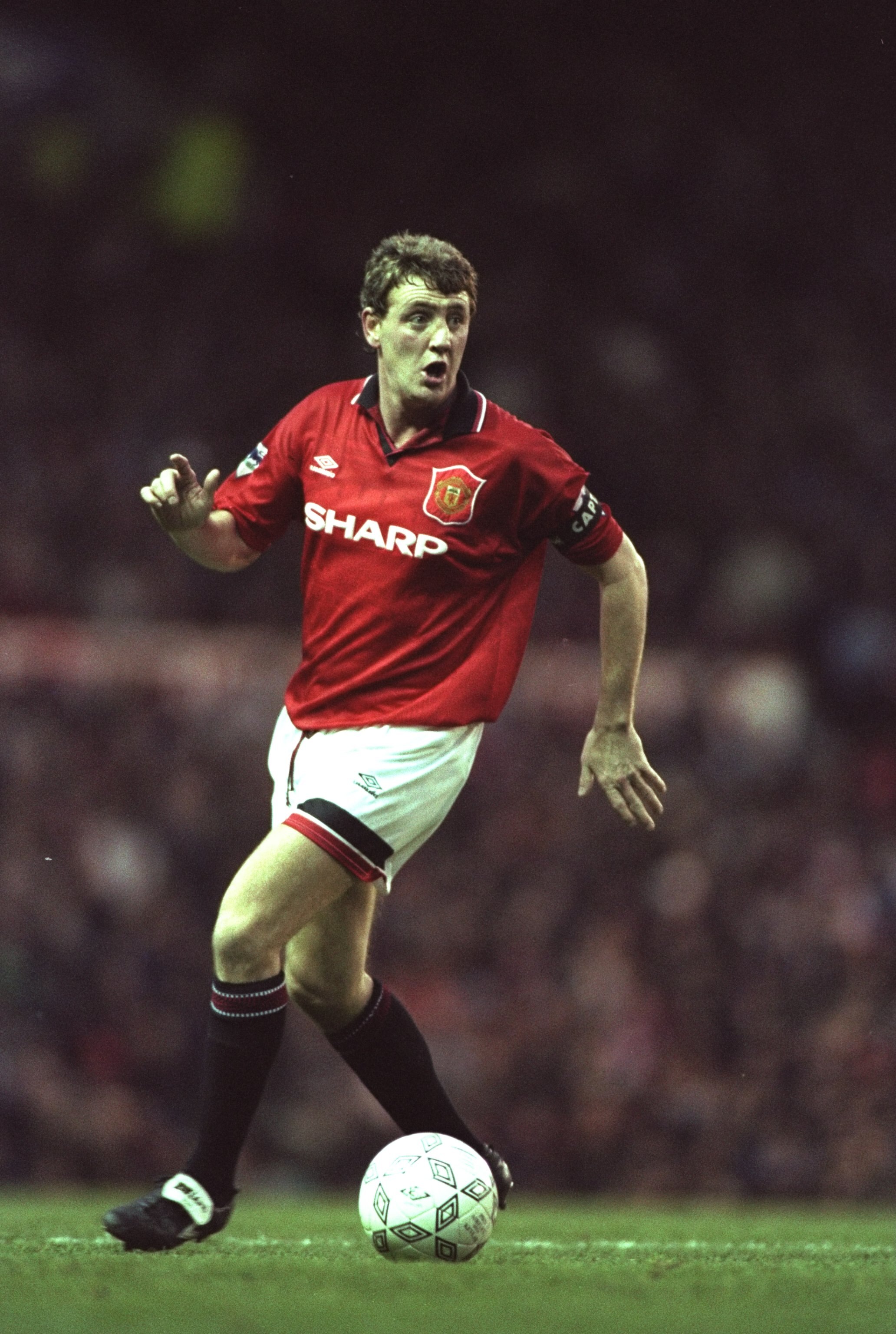 13 Jan 1996:  Steve Bruce of Manchester United in action during an FA Carling Premiership match against Aston Villa at Old Trafford in Manchester, England. The match ended in a 0-0 draw.   \ Mandatory Credit: Shaun  Botterill/Allsport
