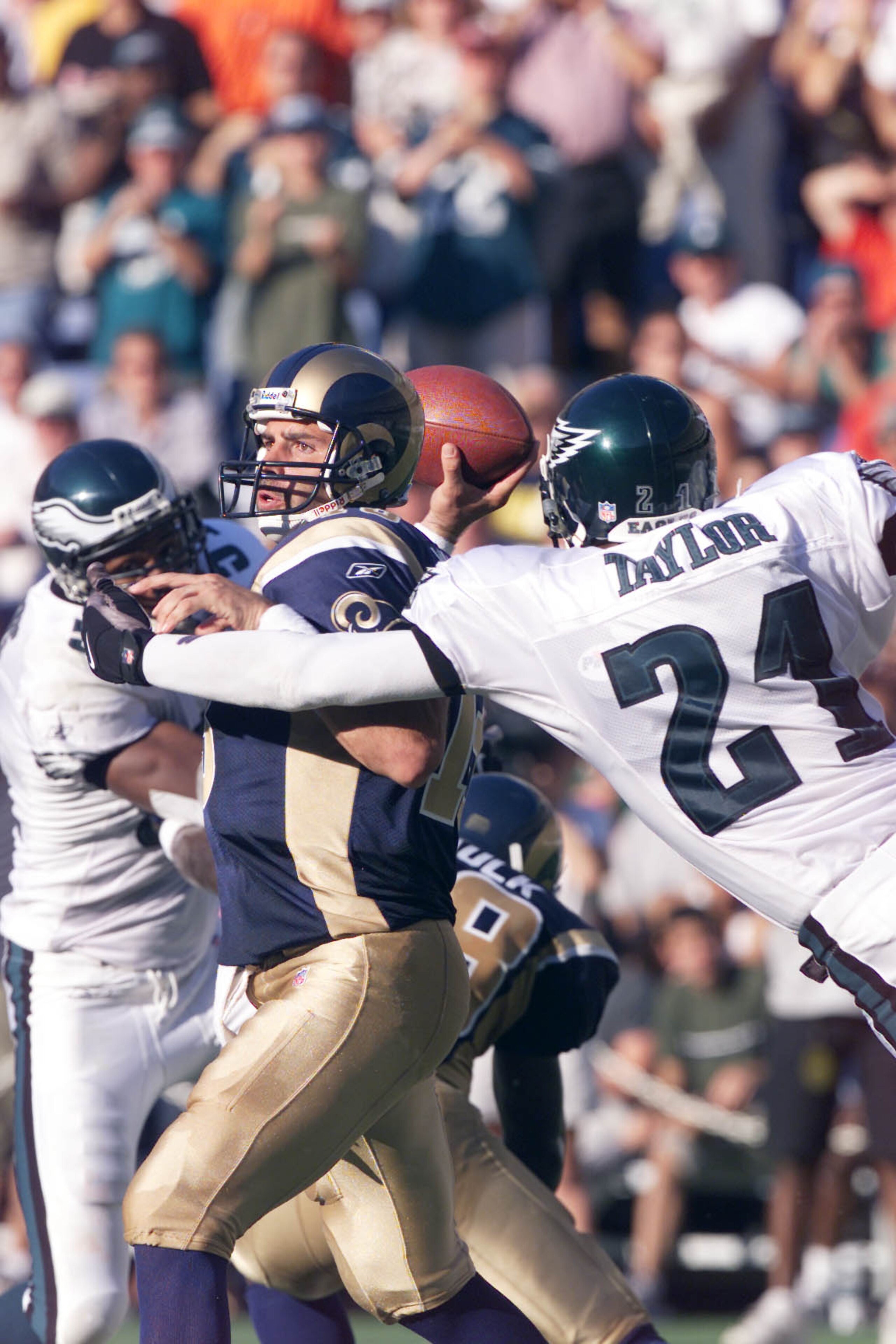 9 SEP 01: Kurt Warner #13 of the St. Louis Rams can''t get a pass off in the first half of the game against the Philadelphia Eagles at Veterans Stadium in Philadelphia Pennsylvania. DIGITAL IMAGE. 9 SEP 01: Kurt Warner #13 of the St. Louis Rams can''t get a pass off in the first half of the game against the Philadelphia Eagles at Veterans Stadium in Philadelphia Pennsylvania. DIGITAL IMAGE.