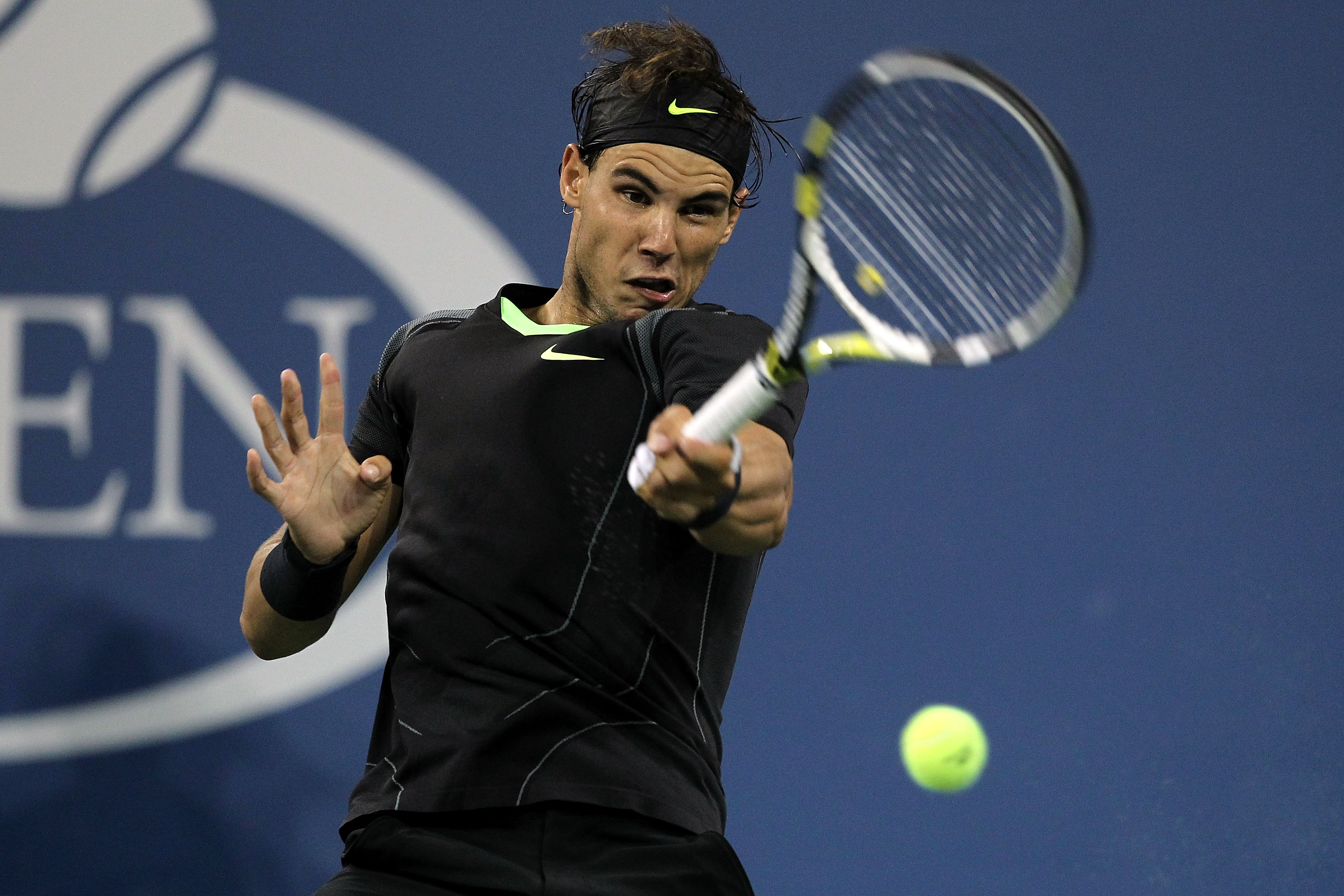 NEW YORK - SEPTEMBER 07:  Rafael Nadal of Spain hits a return against Feliciano Lopez of Spain during his men's singles match on day nine of the 2010 U.S. Open at the USTA Billie Jean King National Tennis Center on September 7, 2010 in the Flushing neighb