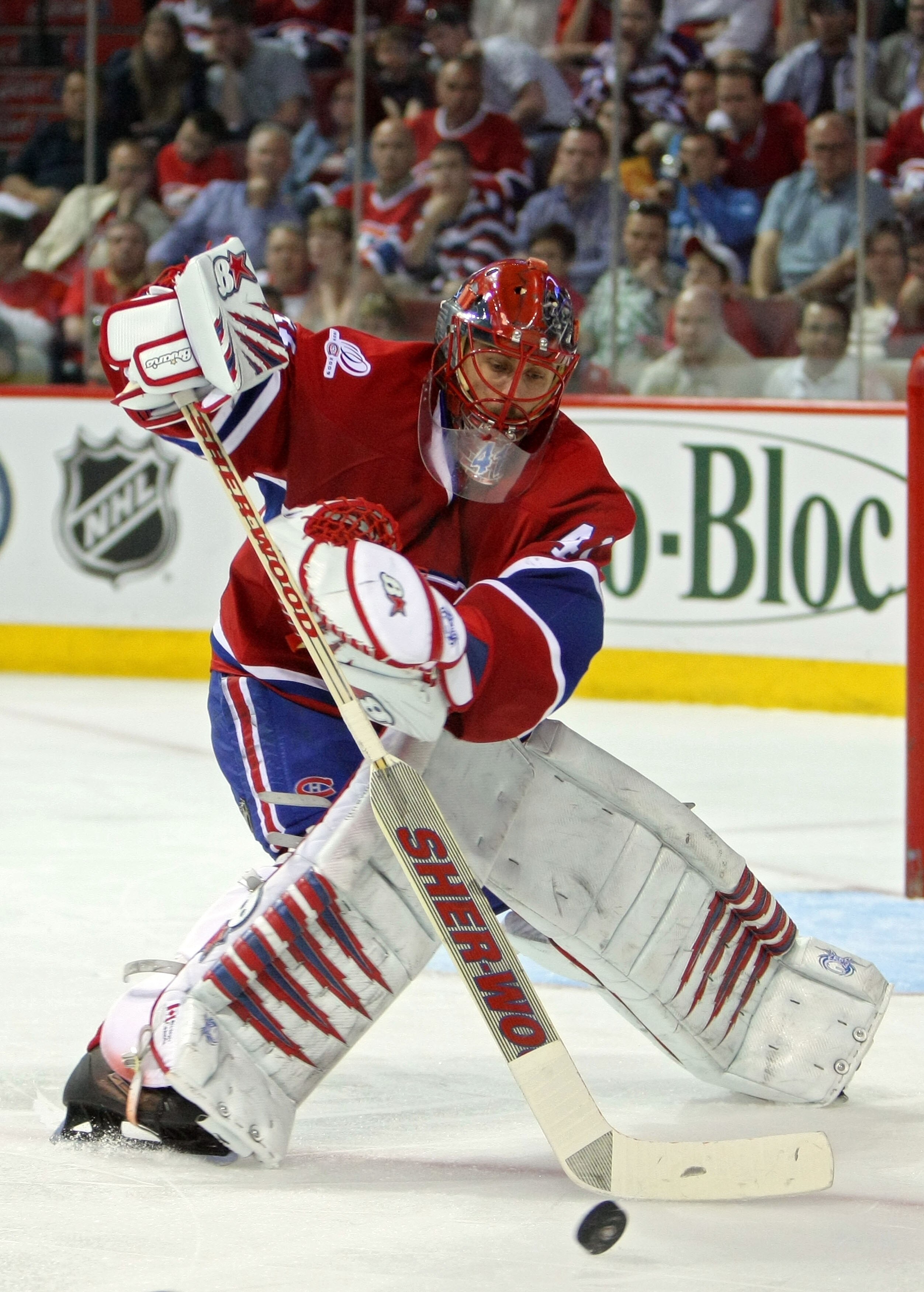 MONTREAL, QC - MAY 22:  Jaroslav Halak #41 of the Montreal Canadiens clears the puck against the Philadelphia Flyers in Game 4 of the Eastern Conference Finals during the 2010 NHL Stanley Cup Playoffs at Bell Centre on May 22, 2010 in Montreal, Canada.  (