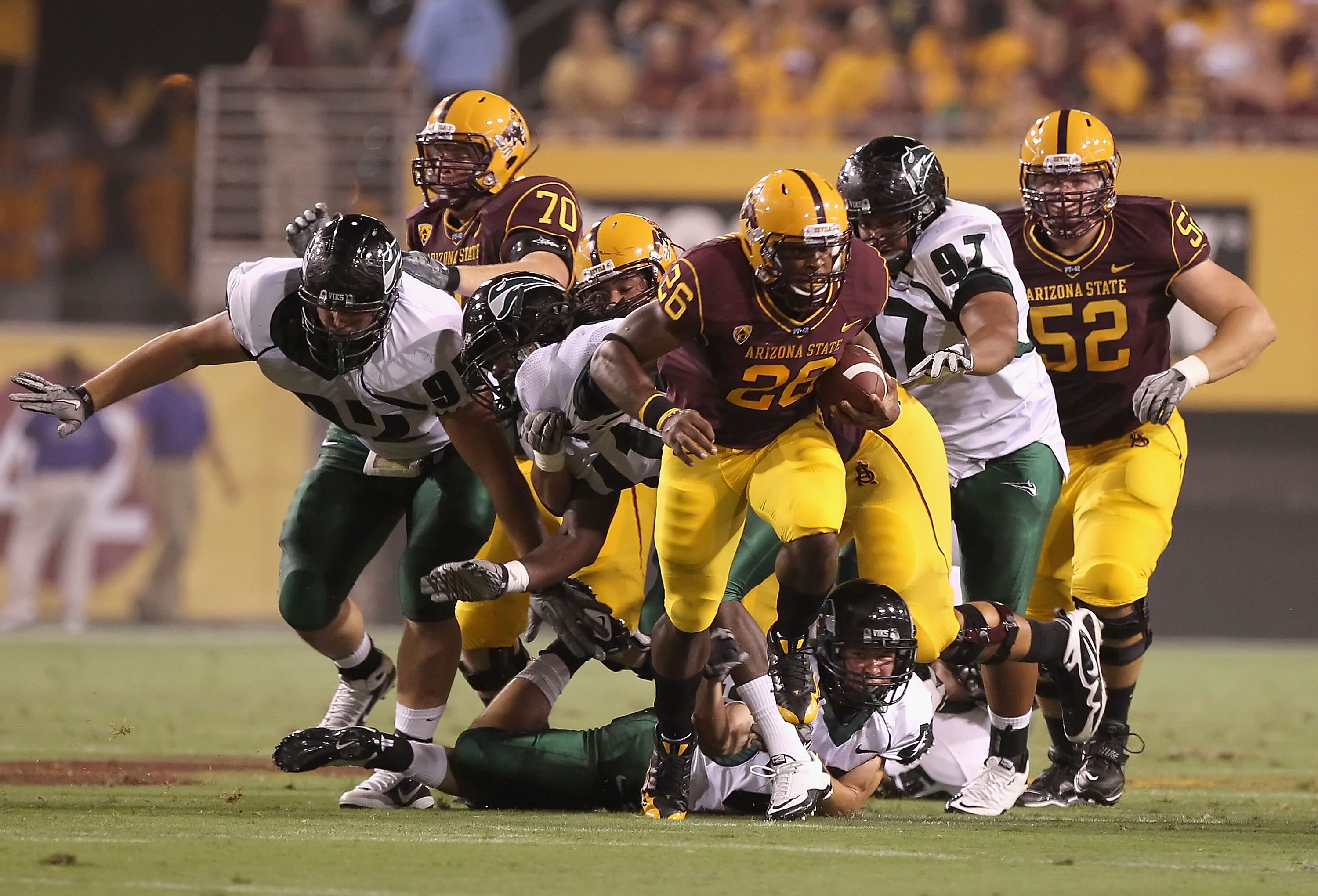TEMPE, AZ - SEPTEMBER 04:  Runningback Cameron Marshall #26 of the Arizona State Sun Devils rushes the ball against the Portland State Vikings during the first quarter of the college football game at Sun Devil Stadium on September 4, 2010 in Tempe, Arizon