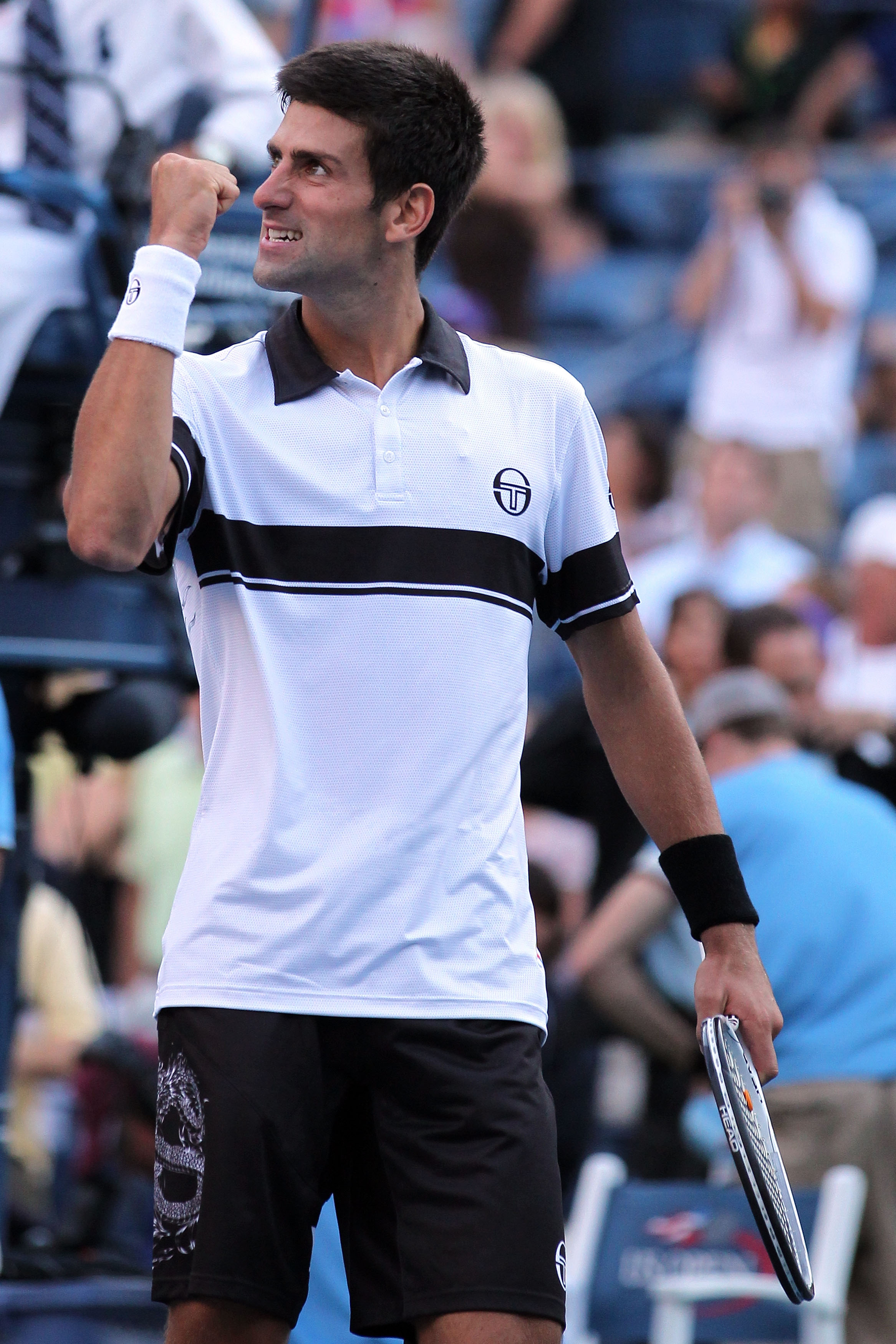 NEW YORK - SEPTEMBER 08:  Novak Djokovic of Serbia celebrates after defeating Gael Monfils of France during his men's singles quarterfinal match on day ten of the 2010 U.S. Open at the USTA Billie Jean King National Tennis Center on September 8, 2010 in t
