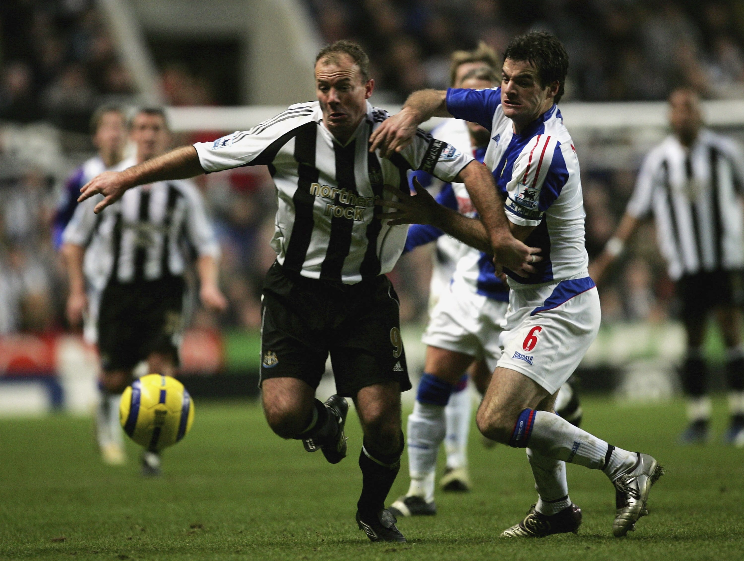 NEWCASTLE, UNITED KINGDOM - JANUARY 21: Alan Shearer of Newcastle United holds off a challenge from Ryan Nelson of Blackburn Rovers during the Barclays Premiership match between Newcastle United and Blackburn Rovers at St James' Park on January 21, 2006 i
