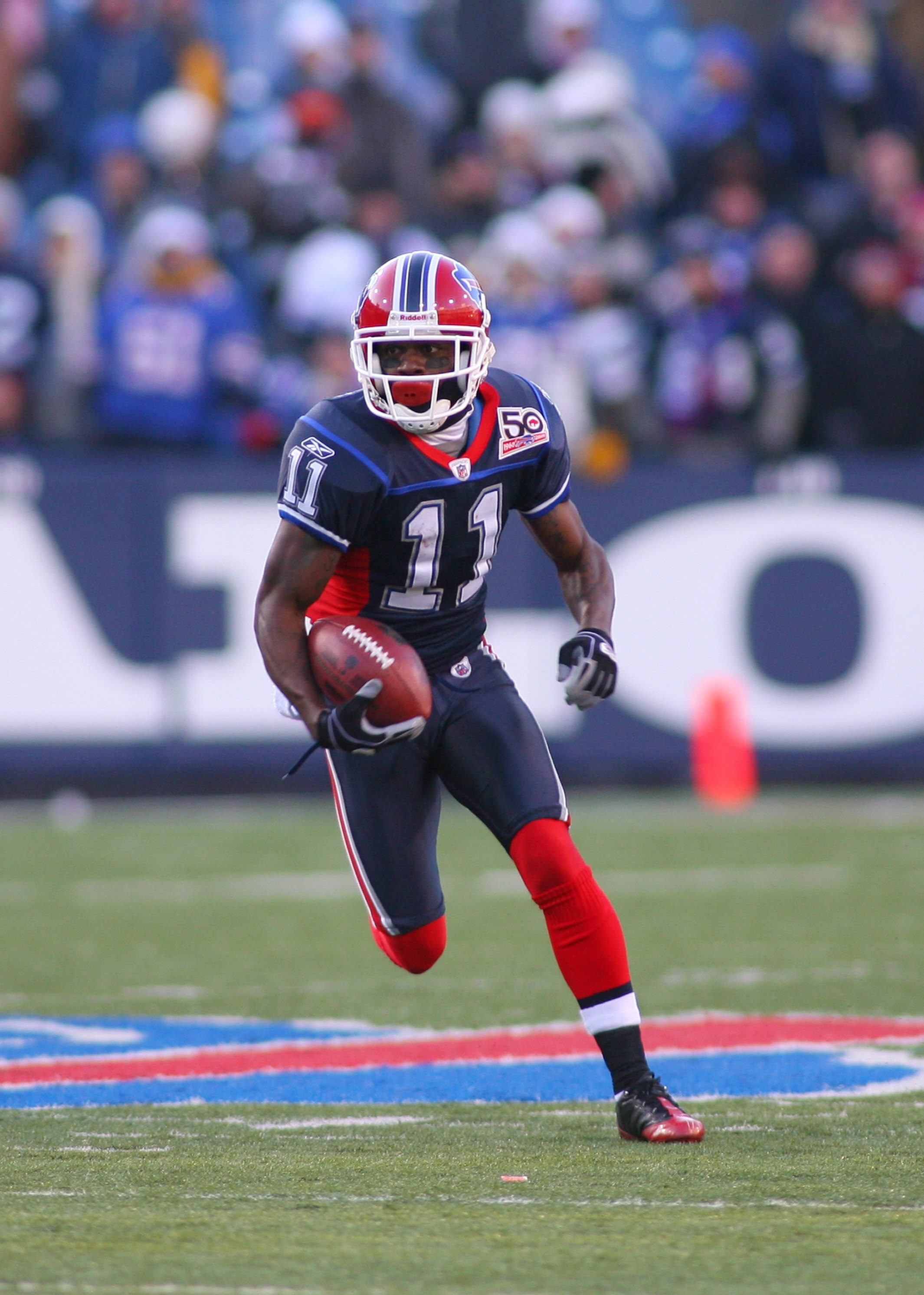 ORCHARD PARK, NY - DECEMBER 20: Roscoe Parrish #11 of the Buffalo Bills runs the ball against the New England Patriots during the game at Ralph Wilson Stadium on December 20, 2009 in Orchard Park, New York. (Photo by: Rick Stewart/Getty Images)