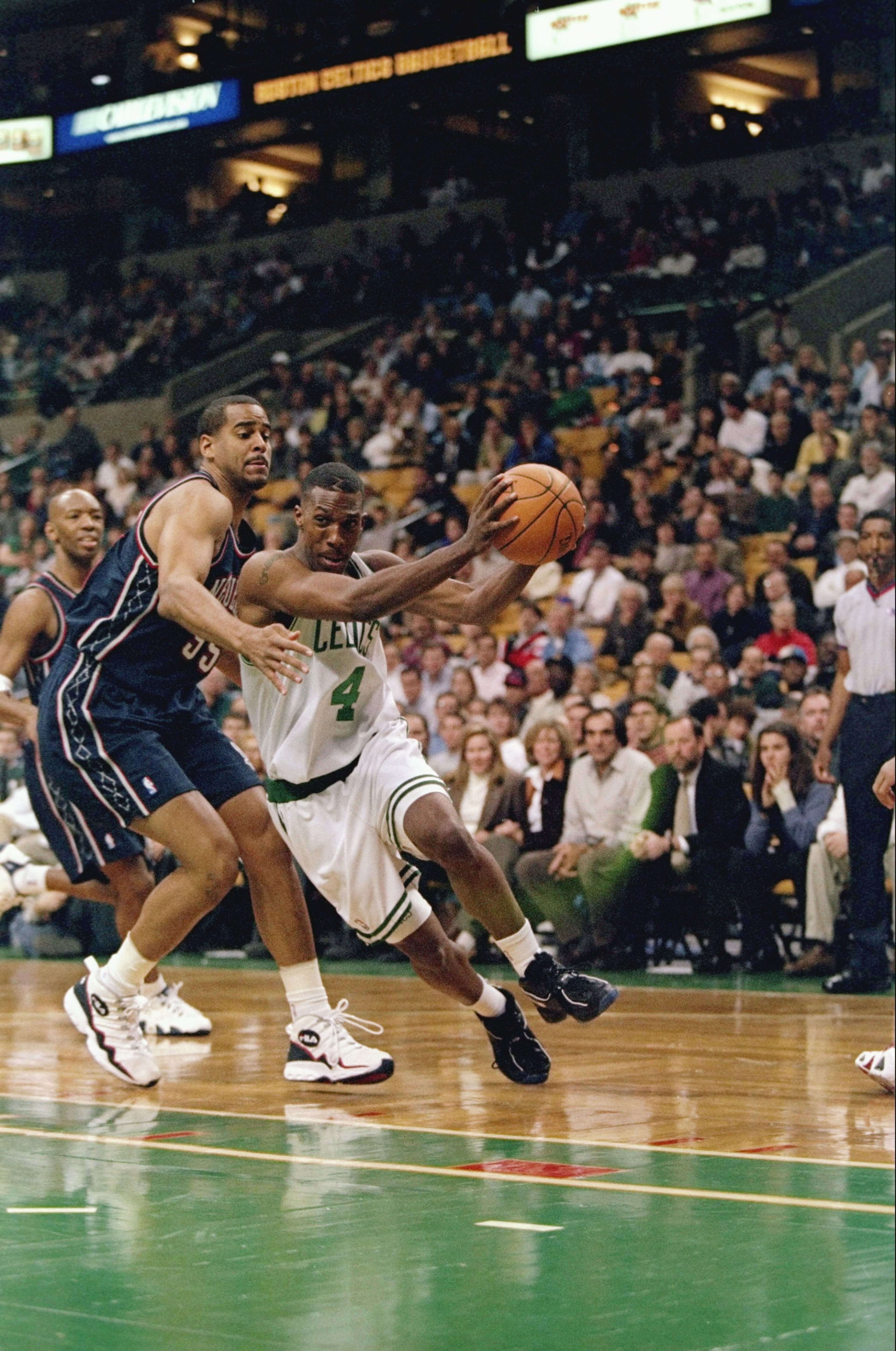 21 Nov 1997: Guard Chauncey Billups of the Boston Celtics (right) in action against forward Jayson Williams of the New Jersey Nets during a game at the Fleet Center in Boston, Massachusetts. The Celtics won the game 101-93. Mandatory Credit: Jamie Squir 21 Nov 1997: Guard Chauncey Billups of the Boston Celtics (right) in action against forward Jayson Williams of the New Jersey Nets during a game at the Fleet Center in Boston, Massachusetts. The Celtics won the game 101-93. Mandatory Credit: Jamie Squir