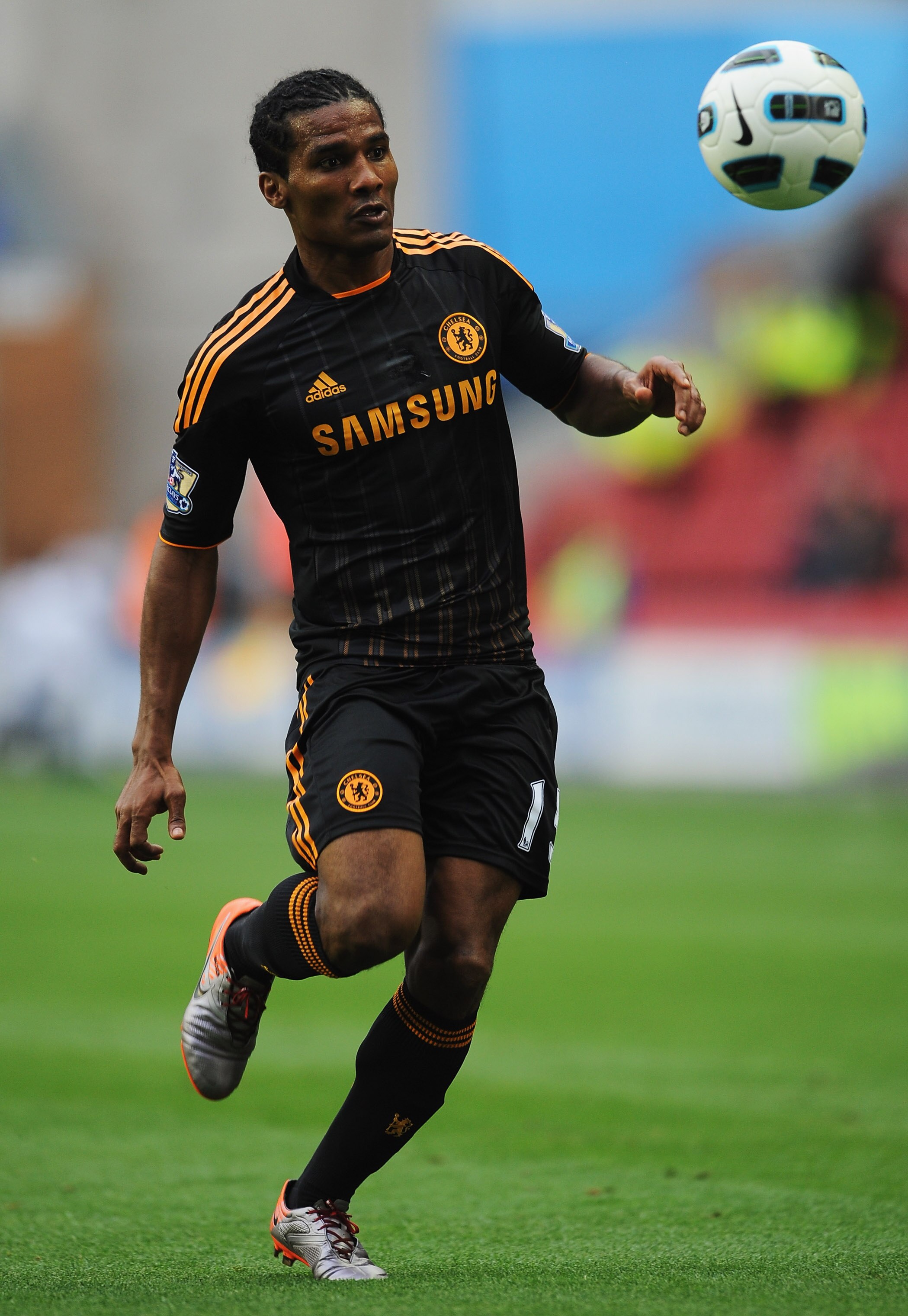 WIGAN, ENGLAND - AUGUST 21:  Florent Malouda of Chelsea in action during the Barclays Premier League match between Wigan Athletic and Chelsea at DW Stadium on August 21, 2010 in Wigan, England.  (Photo by Getty Images for Chelsea FC)