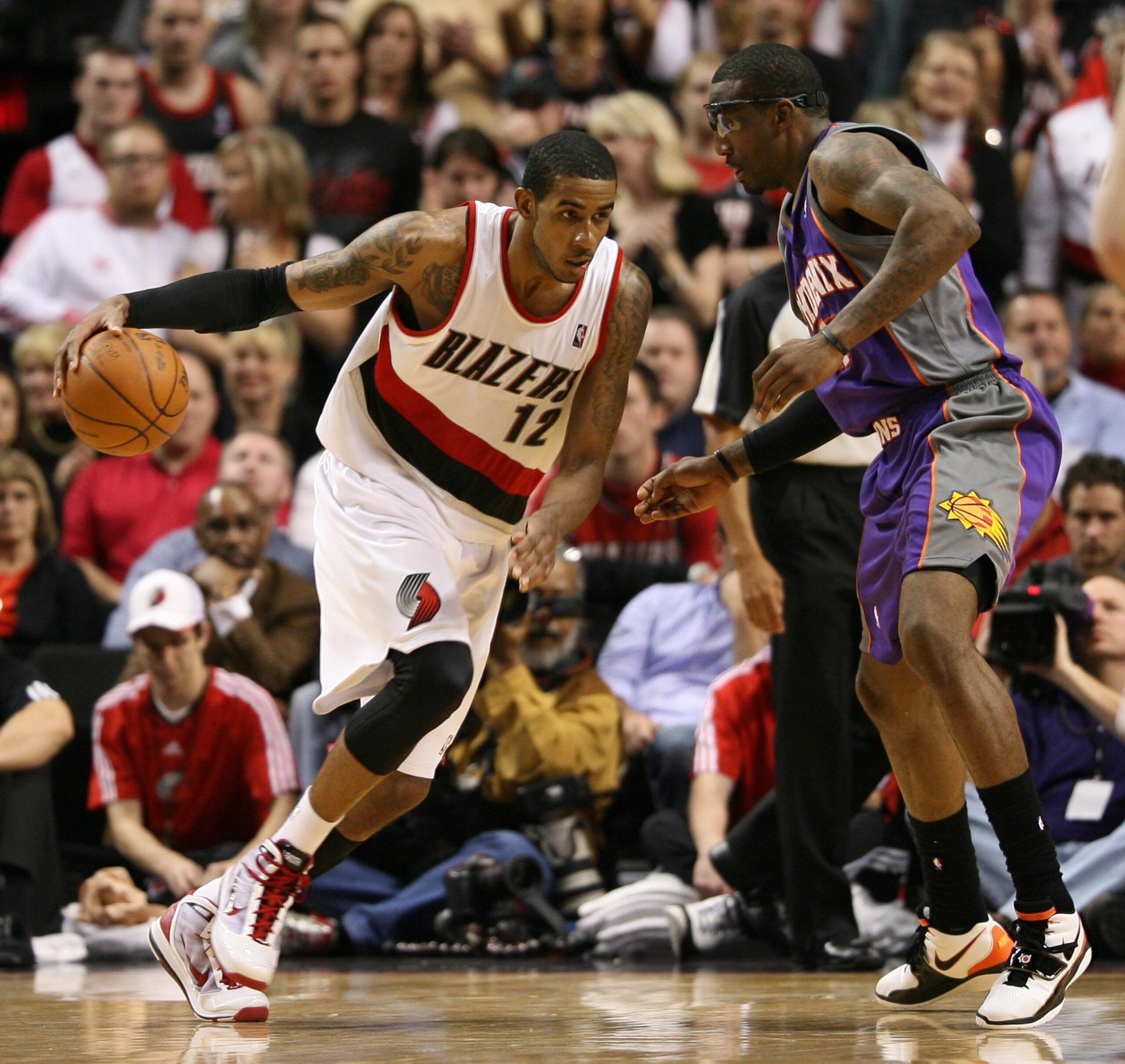 PORTLAND, OR - APRIL 29: LaMarcus Aldridge #12 of the Portland Trail Blazers in action against Amare Stoudemire #1 of the Phoenix Suns during Game Six of the Western Conference Quarterfinals of the NBA Playoffs on April 29, 2010 at the Rose Garden in Por PORTLAND, OR - APRIL 29: LaMarcus Aldridge #12 of the Portland Trail Blazers in action against Amare Stoudemire #1 of the Phoenix Suns during Game Six of the Western Conference Quarterfinals of the NBA Playoffs on April 29, 2010 at the Rose Garden in Por