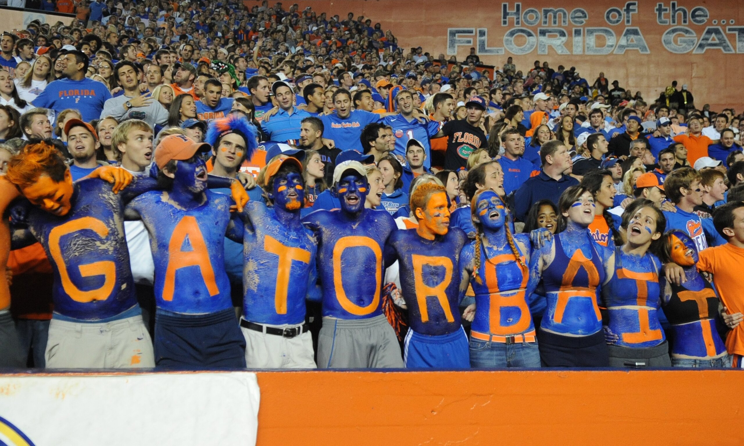 GAINESVILLE, FL - NOVEMBER 7: Student fans of the Florida Gators show team colors during play against the Vanderbilt Commodores  on November 7, 2009 at Ben Hill Griffin Stadium in Gainesville, Florida.  (Photo by Al Messerschmidt/Getty Images)