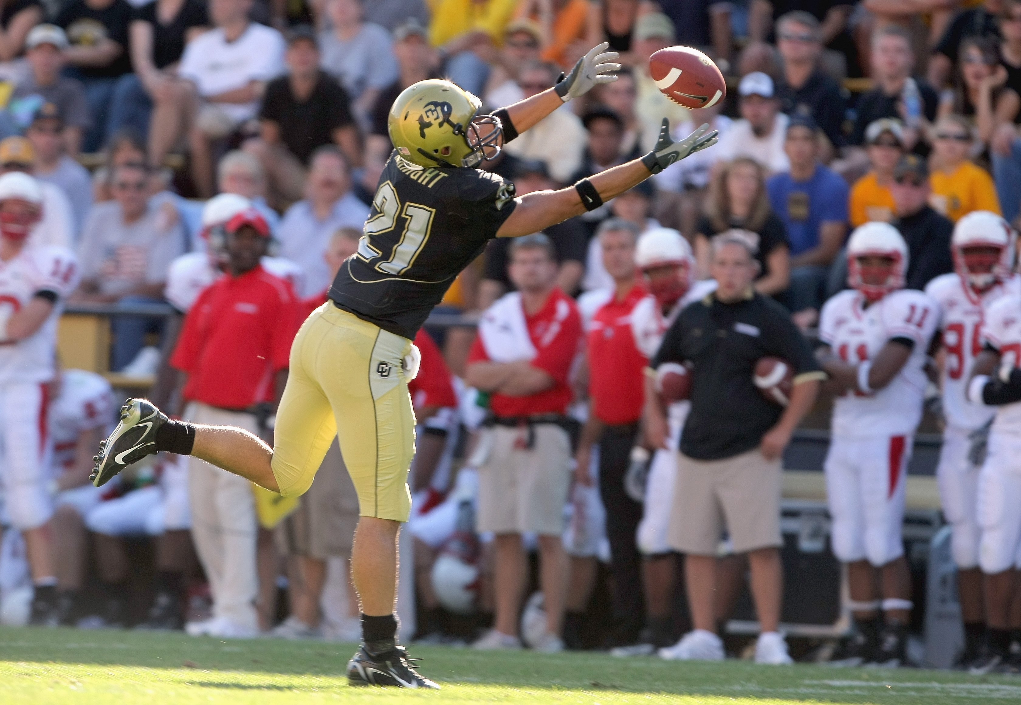 BOULDER, CO - SEPTEMBER 22:  Scotty McKnight # 21 of the Colorado Buffaloes reaches for the catch against the Miami of Ohio Redhawks at Folsom Field on September 22, 2007 in Boulder, Colorado. Colorado defeated Miami of Ohio 42-0. (Photo by Doug Pensinger