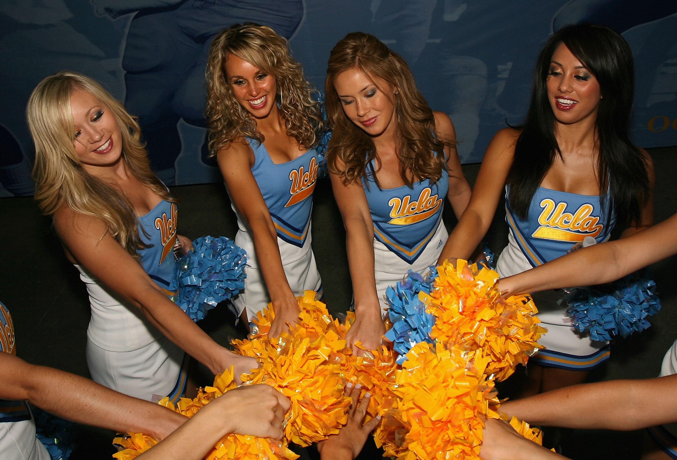 PASADENA, CA - SEPTEMBER 20: Tthe UCLA Bruins cheerleaders perform before the college football game against the Arizona Wildcats at the Rose Bowl on September 13, 2008 in Pasadena, California. The Wildcats defeated the Bruins 31-10.  (Photo by Christian P