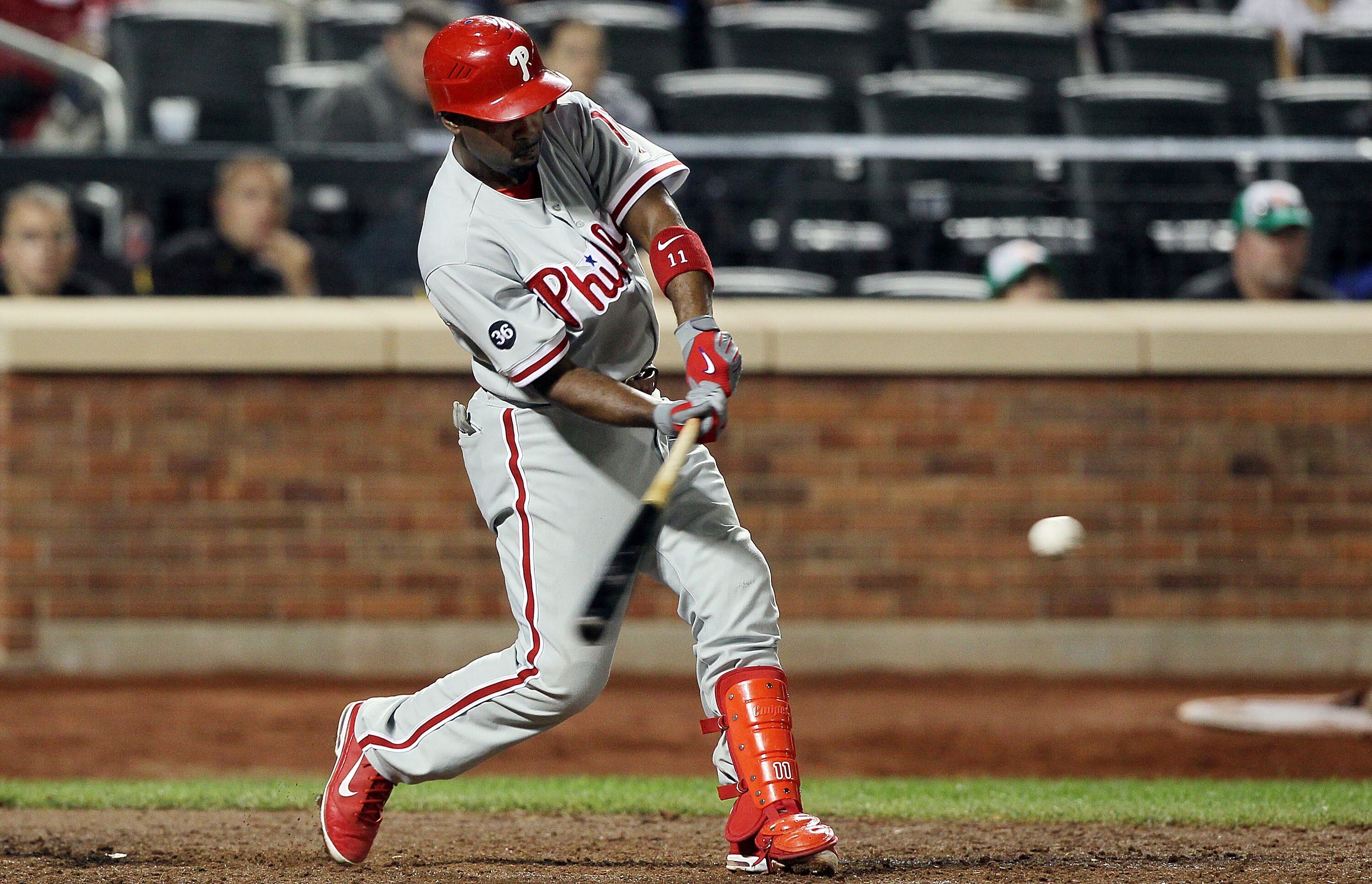 NEW YORK - AUGUST 14:  Jimmy Rollins #11 of the Philadelphia Phillies bats against the New York Mets on August 14, 2010 at Citi Field in the Flushing neighborhood of the Queens borough of New York City.  (Photo by Jim McIsaac/Getty Images)