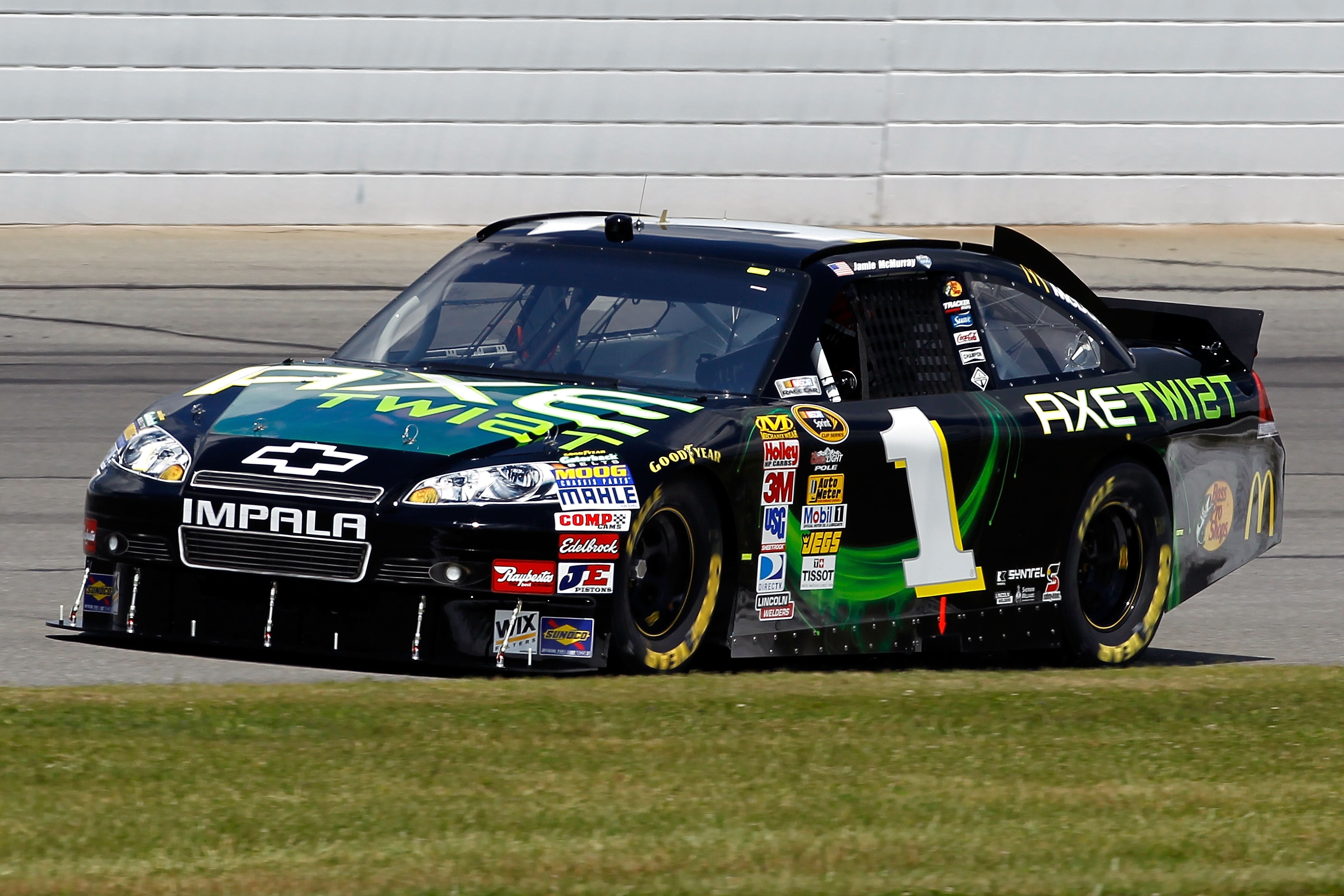 LONG POND, PA - JULY 30:  Jamie McMurray drives the #1 AXE Twist Chevrolet during practice for the NASCAR Sprint Cup Series Sunoco Red Cross Pennsylvania 500 at Pocono Raceway on July 30, 2010 in Long Pond, Pennsylvania.  (Photo by Chris Trotman/Getty Ima