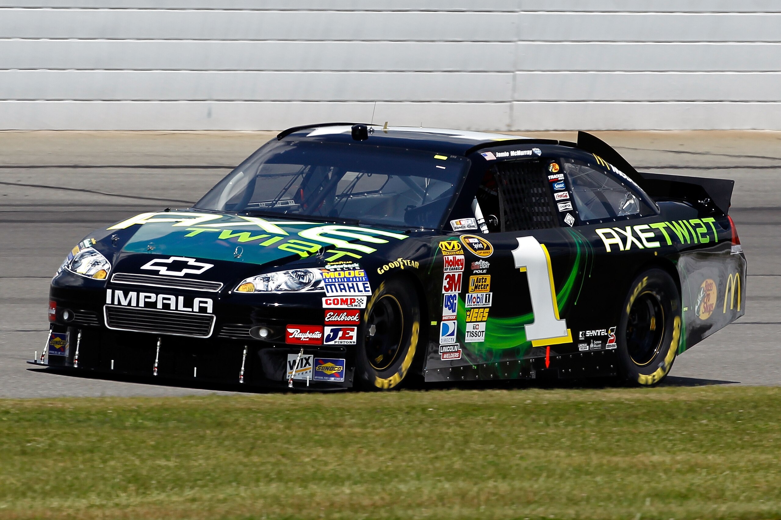 LONG POND, PA - JULY 30:  Jamie McMurray drives the #1 AXE Twist Chevrolet during practice for the NASCAR Sprint Cup Series Sunoco Red Cross Pennsylvania 500 at Pocono Raceway on July 30, 2010 in Long Pond, Pennsylvania.  (Photo by Chris Trotman/Getty Ima