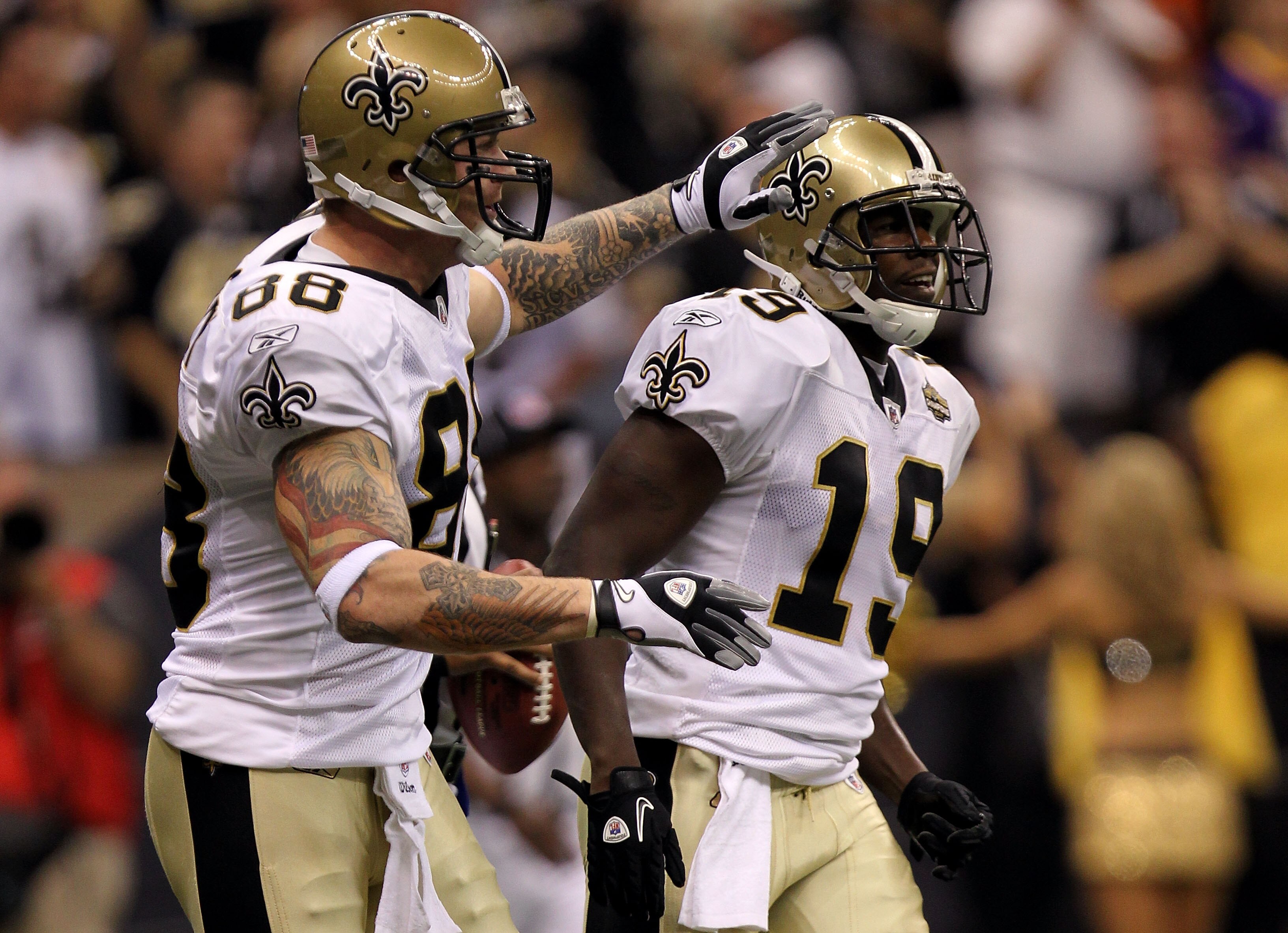 NEW ORLEANS - SEPTEMBER 09:  Devery Henderson #19 of the New Orleans Saints celebrates with teammate Jeremy Shockey #88 (L) after Henderson scored a 29-yard touchdown reception in the first quarter against the Minnesota Vikings at Louisiana Superdome on S