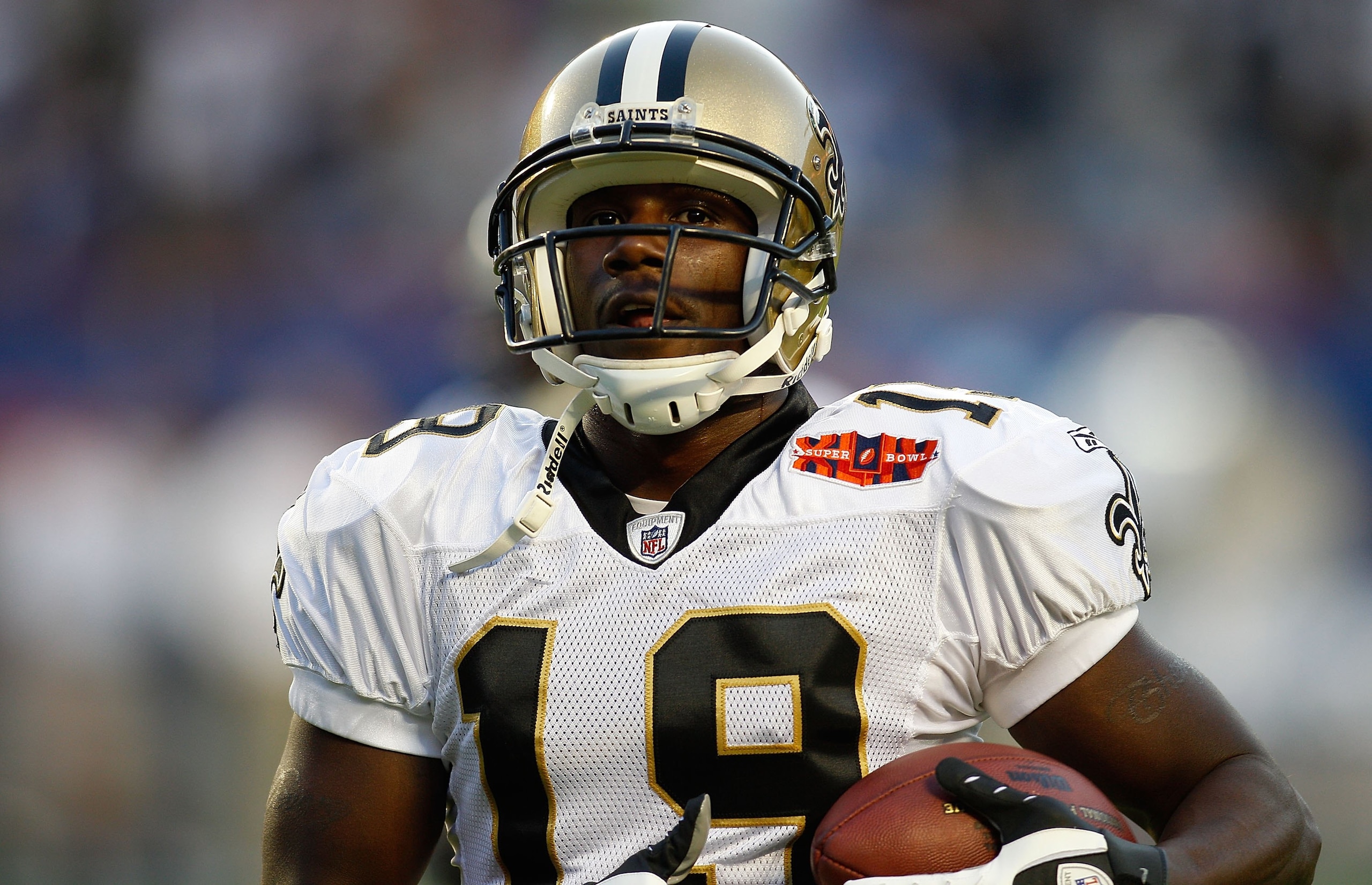 MIAMI GARDENS, FL - FEBRUARY 07:  Wide receiver Devery Henderson #19 of the New Orleans Saints looks on before the start of Super Bowl XLIV against the Indianapolis Colts on February 7, 2010 at Sun Life Stadium in Miami Gardens, Florida.  (Photo by Chris 