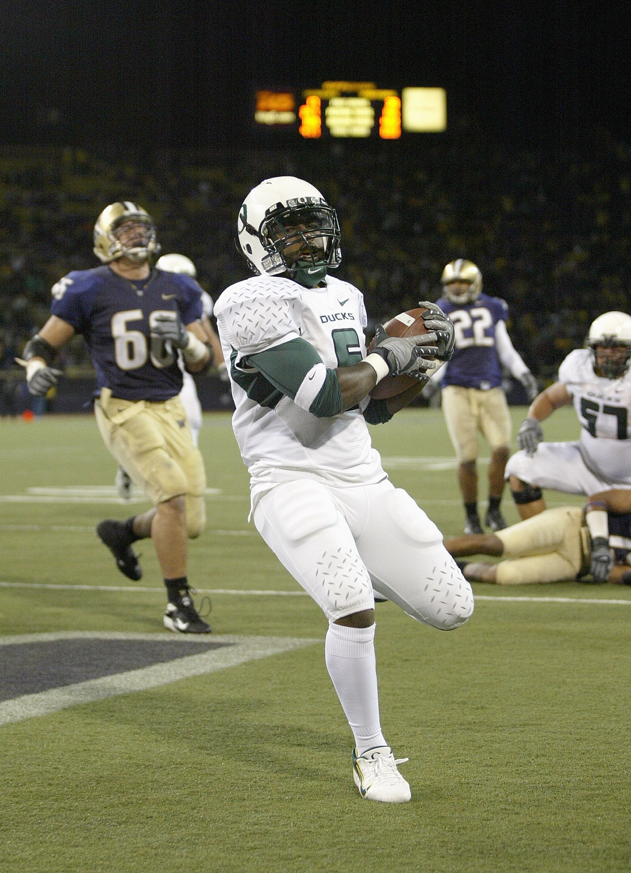SEATTLE - OCTOBER 20: Remene Alston Jr #5 of the Oregon Ducks runs in for a touchdown during the game against the Washington Huskies at Husky Stadium on October 20, 2007 in Seattle, Washington. The Ducks defeated the Huskies 55-34. (Photo by Otto Greule J