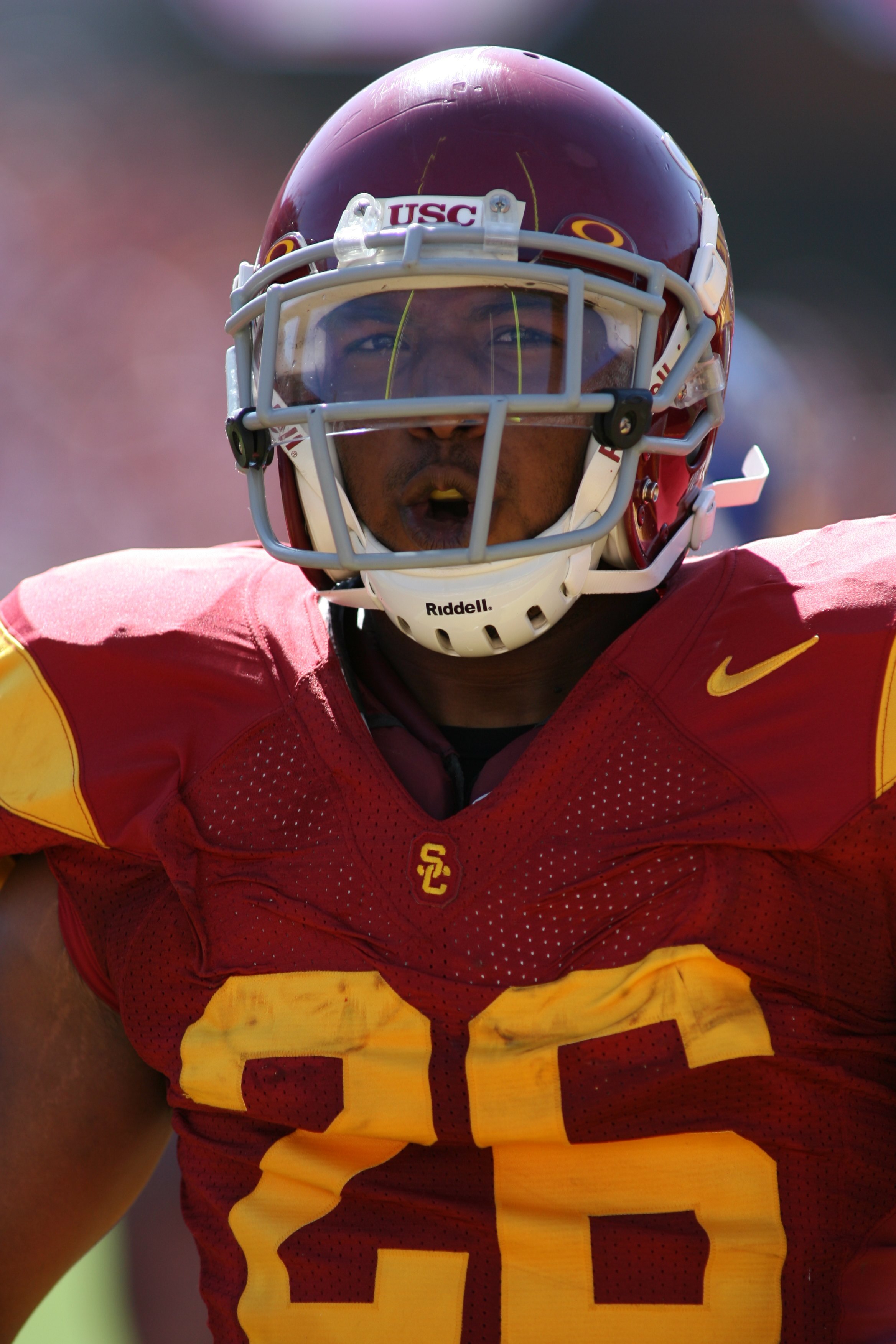 LOS ANGELES, CA - SEPTEMBER 5:  Running back Marc Tyler #26 of the USC Trojans celebrates after his touchdown against the San Jose State Spartans on September 5, 2009 at the Los Angeles Memorial Coliseum in Los Angeles, California.  USC won 56-3.  (Photo
