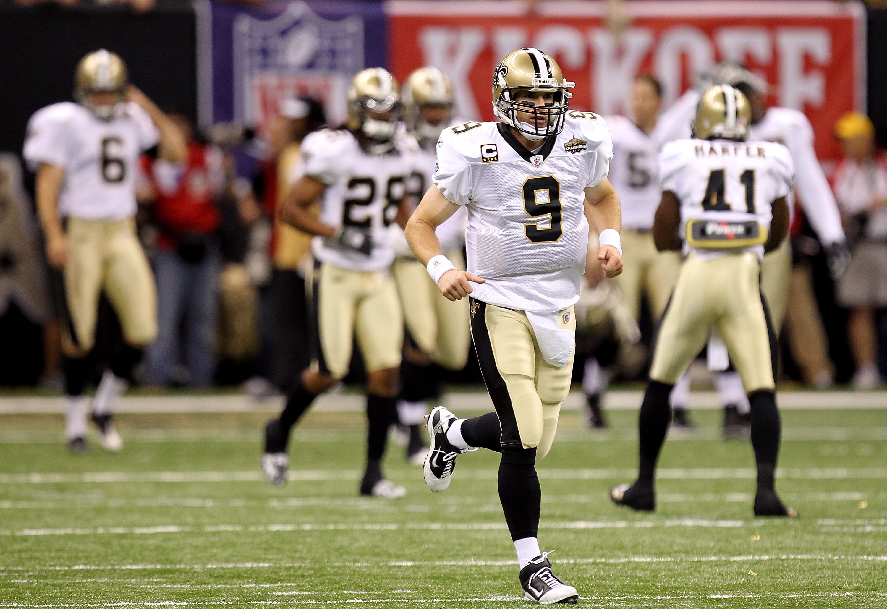 NEW ORLEANS - SEPTEMBER 09:  Drew Brees #9 of the New Orleans Saints runs on the field during warm ups against the Minnesota Vikings at Louisiana Superdome on September 9, 2010 in New Orleans, Louisiana.  (Photo by Ronald Martinez/Getty Images)