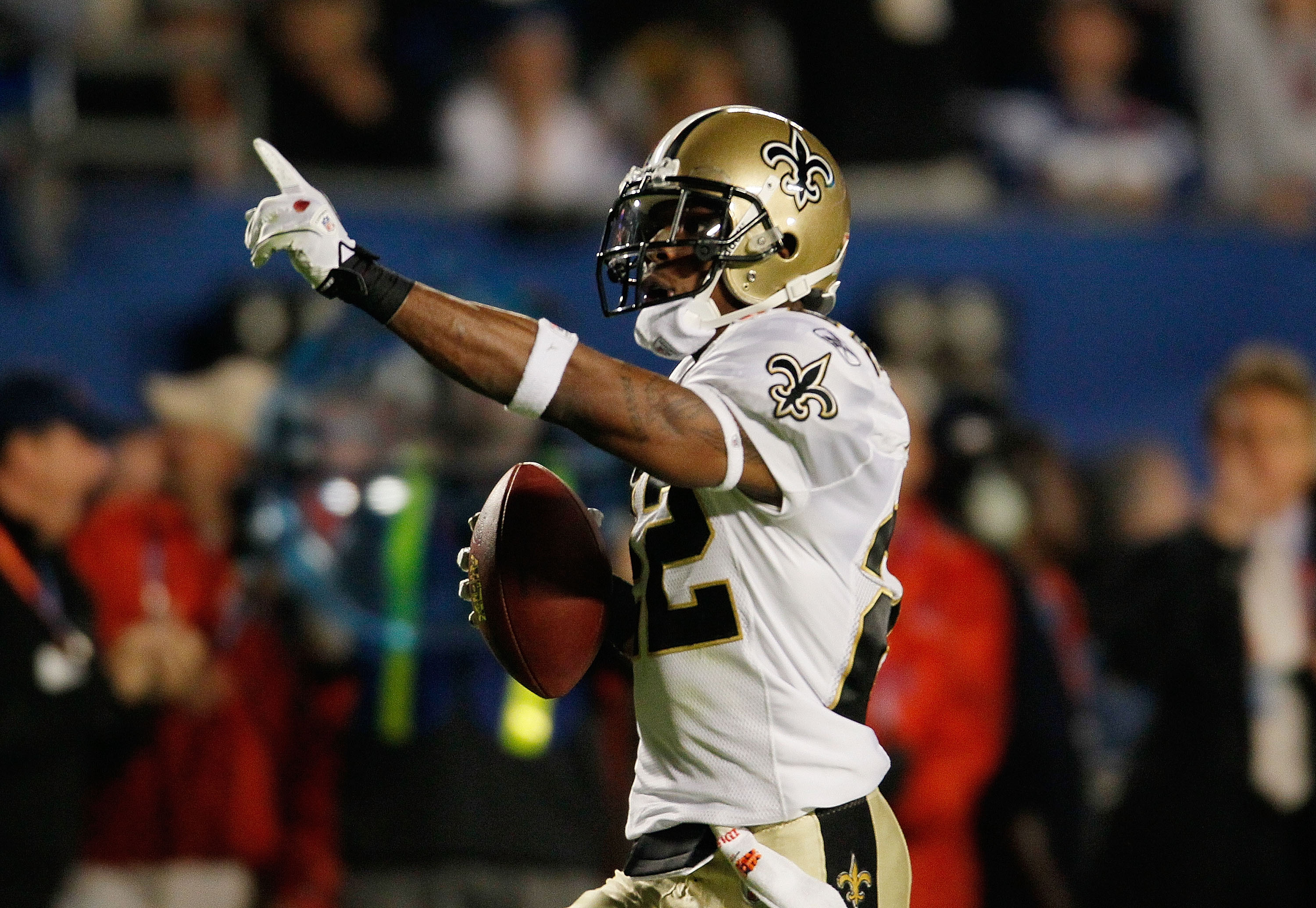 MIAMI GARDENS, FL - FEBRUARY 07:  Tracy Porter #22 of the New Orleans Saints intercepts a ball thrown by Peyton Manning of the Indianapolis Colts and returns it for a touchdown in the fourth quarter during Super Bowl XLIV on February 7, 2010 at Sun Life S