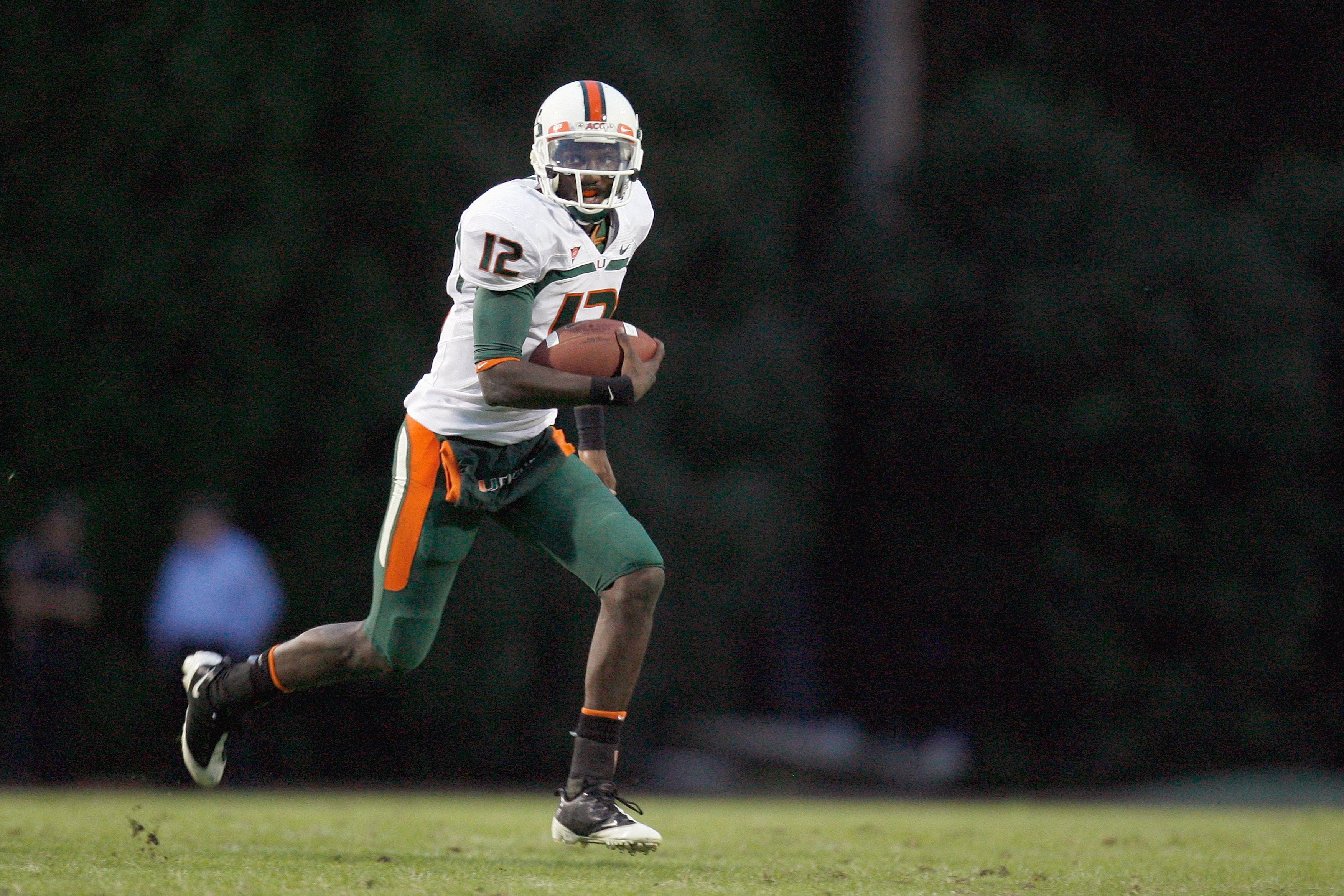 DURHAM, NC - OCTOBER 18: Quarterback  Jacory Harris #12 of the Miami Hurricanes runs the ball on the field during the game against the Duke Blue Devils at Wallace Wade Stadium on October 18, 2008 in Durham, North Carolina.  (Photo by Kevin C. Cox/Getty Im