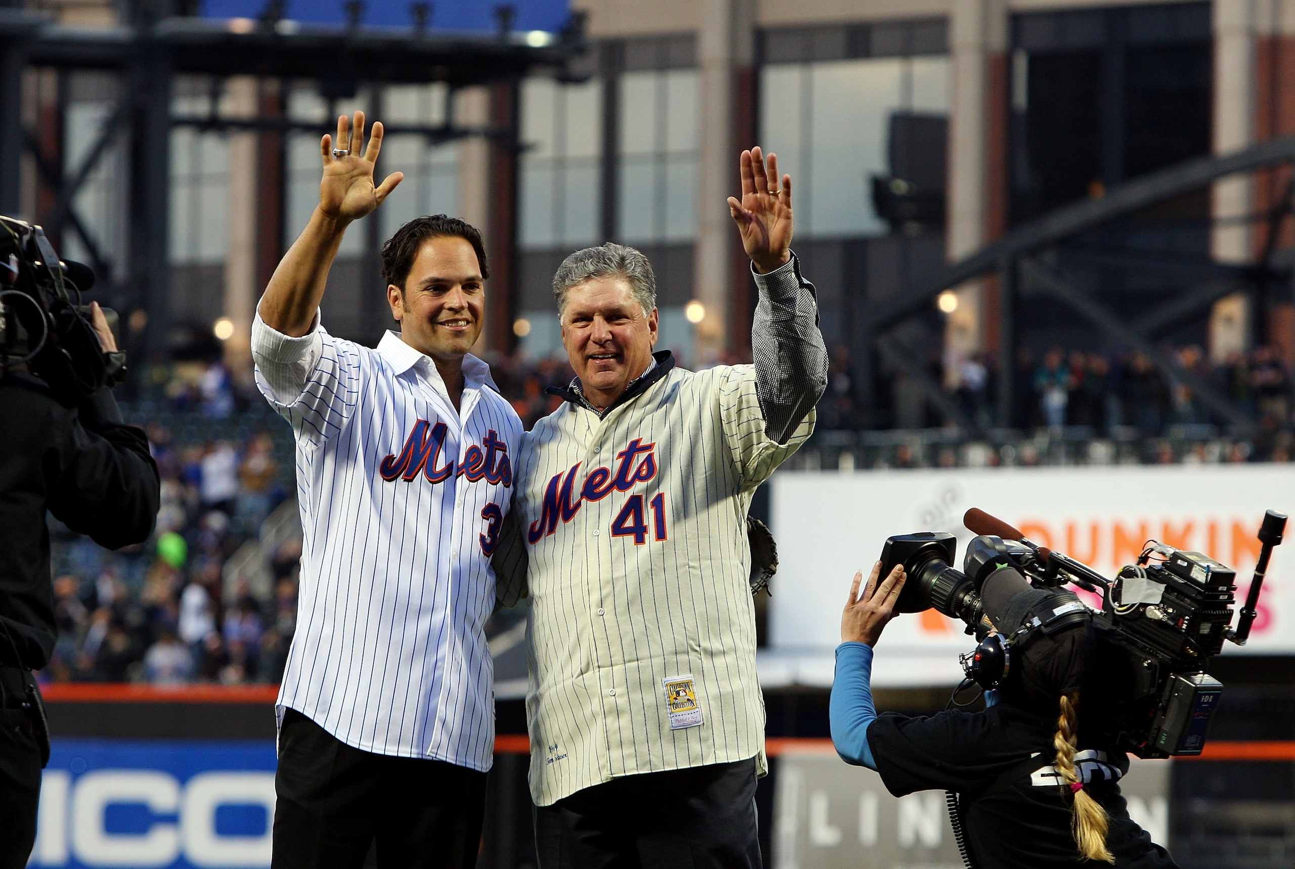 NEW YORK - APRIL 13:  Former Mets players Mike Piazza and Tom Seaver greet fans before throwing out the first pitch of the San Diego Padres against the New York Mets during opening day at Citi Field on April 13, 2009 in the Flushing neighborhood of the Qu