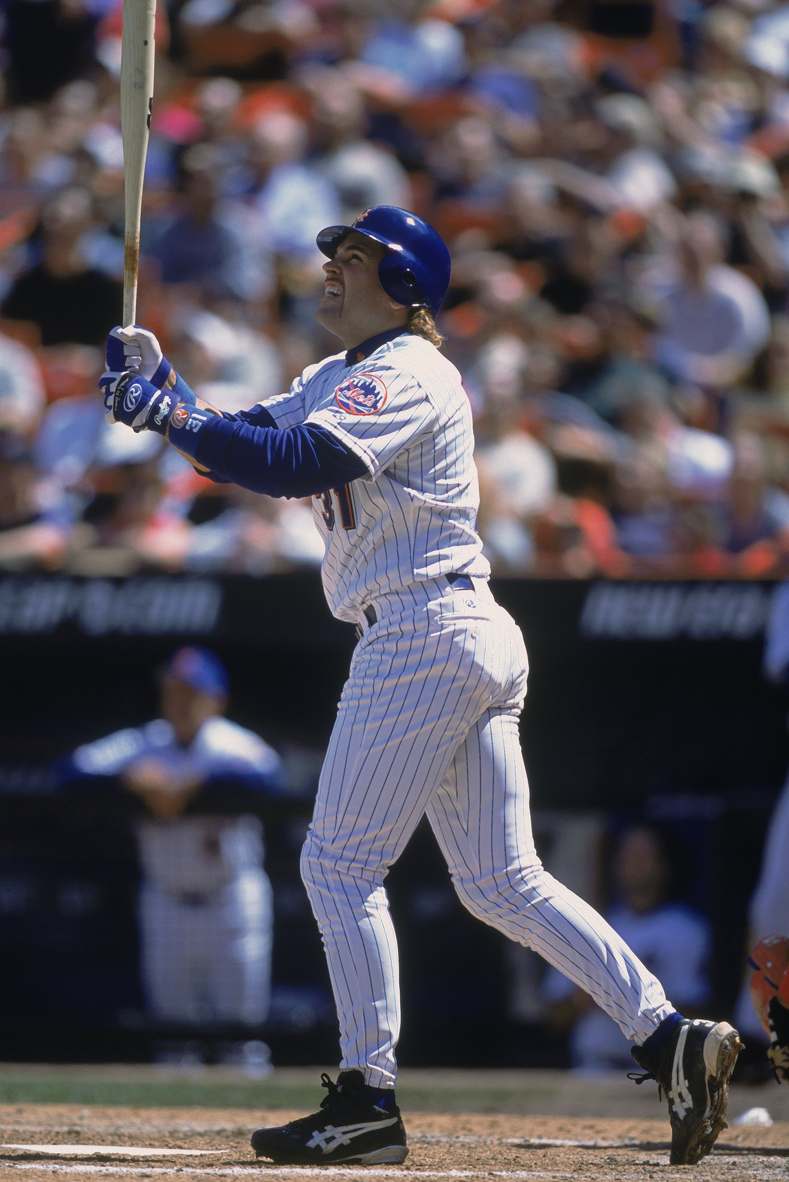 30 May 2001:  Mike Piazza #31 of the New York Mets watches his hit during the game against the Philladelphia Phillies at Shea Stadium in Flushing, New York. The Phillies defeated the Mets 6-3.Mandatory Credit: Jamie Squire  /Allsport