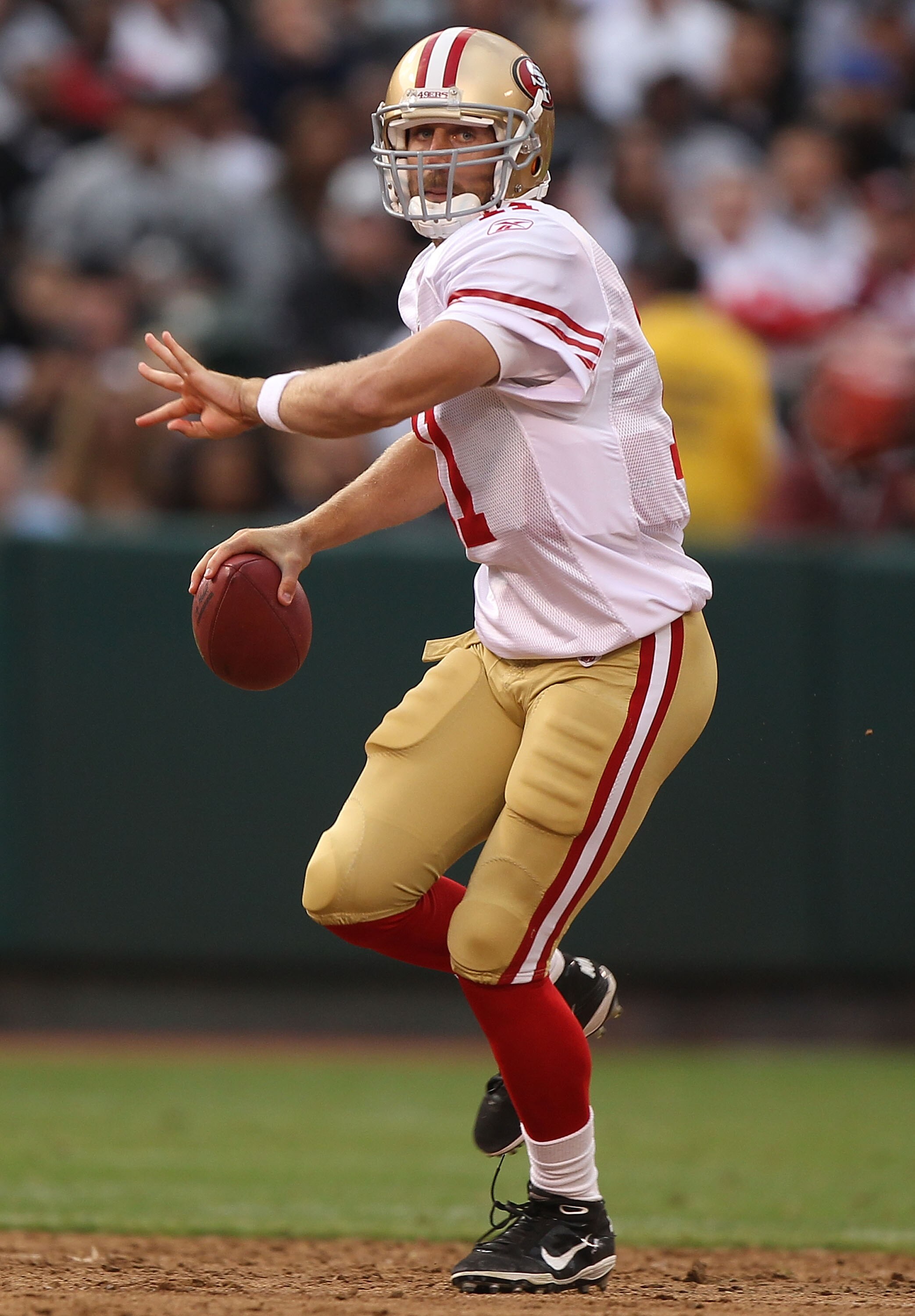 OAKLAND, CA - AUGUST 28: Alex Smith #11 of the San Francisco 49ers passes against the Oakland Raiders during an NFL preseason game at Oakland-Alameda County Coliseum on August 28, 2010 in Oakland, California.  (Photo by Jed Jacobsohn/Getty Images)