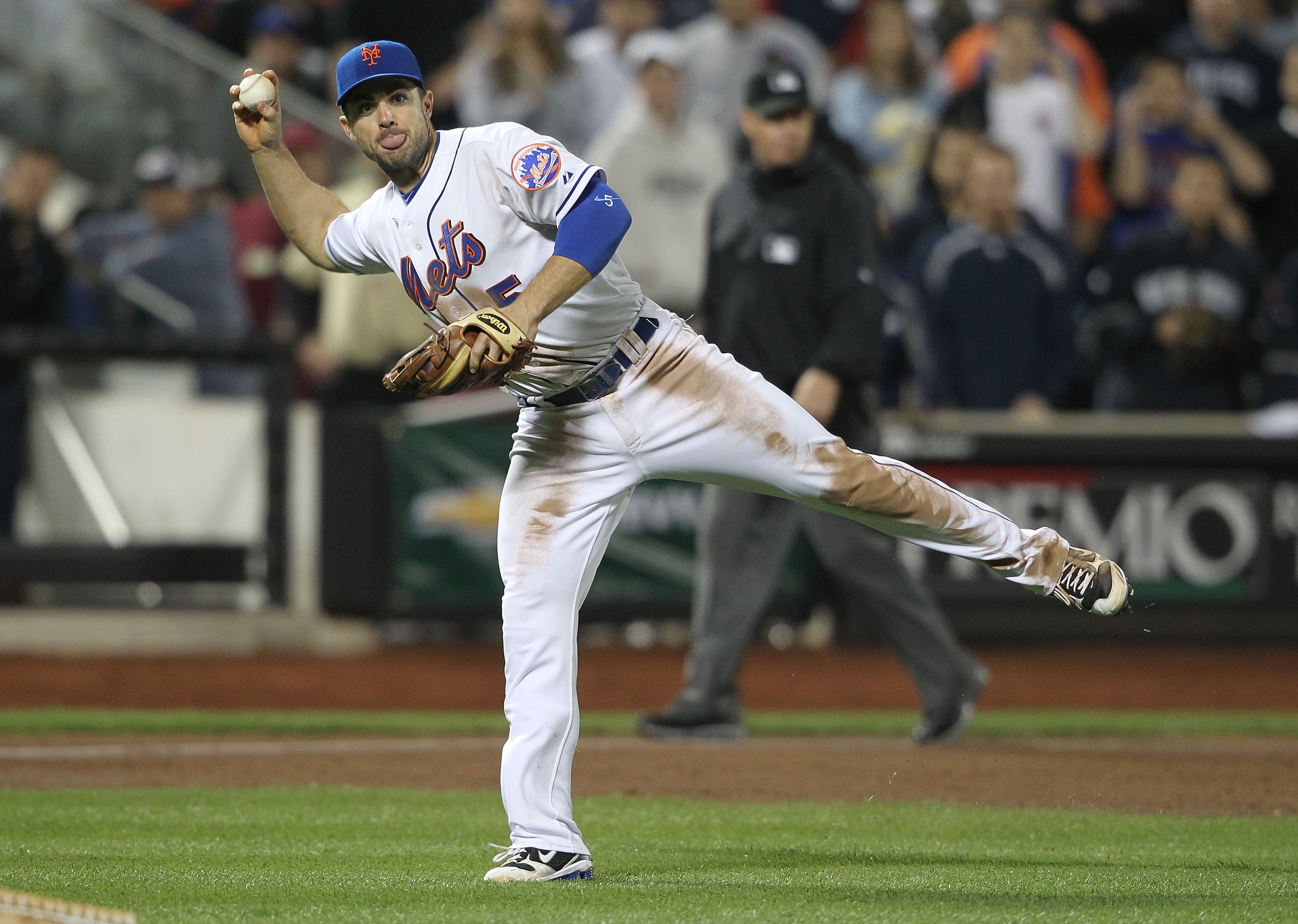 NEW YORK - MAY 23:  David Wright #5 of the New York Mets throws to first against the New York Yankees on May 23, 2010 at Citi Field in the Flushing neighborhood of the Queens borough of New York City.  (Photo by Nick Laham/Getty Images)