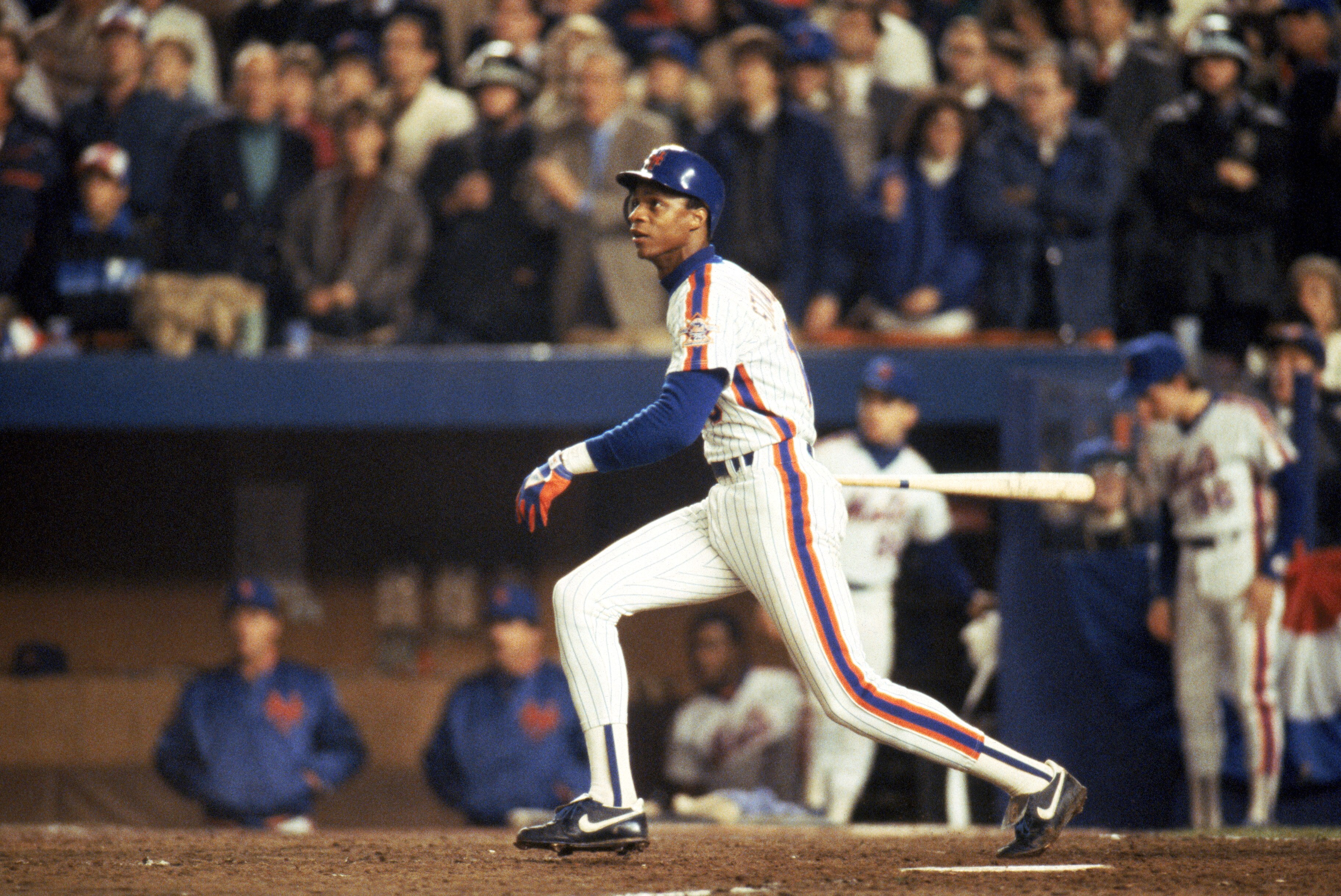 FLUSHING, NY - OCTOBER 27:  Right fielder Darryl Strawberry #18 of the New York Mets swings during game 7 of the 1986 World Series against the Boston Red Sox at Shea Stadium on October 27, 1986 in Flushing, New York. The Mets won the series 4-3.  (Photo b