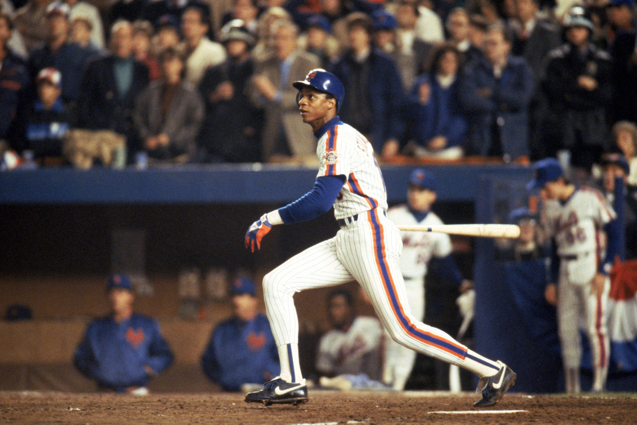 FLUSHING, NY - OCTOBER 27:  Right fielder Darryl Strawberry #18 of the New York Mets swings during game 7 of the 1986 World Series against the Boston Red Sox at Shea Stadium on October 27, 1986 in Flushing, New York. The Mets won the series 4-3.  (Photo b