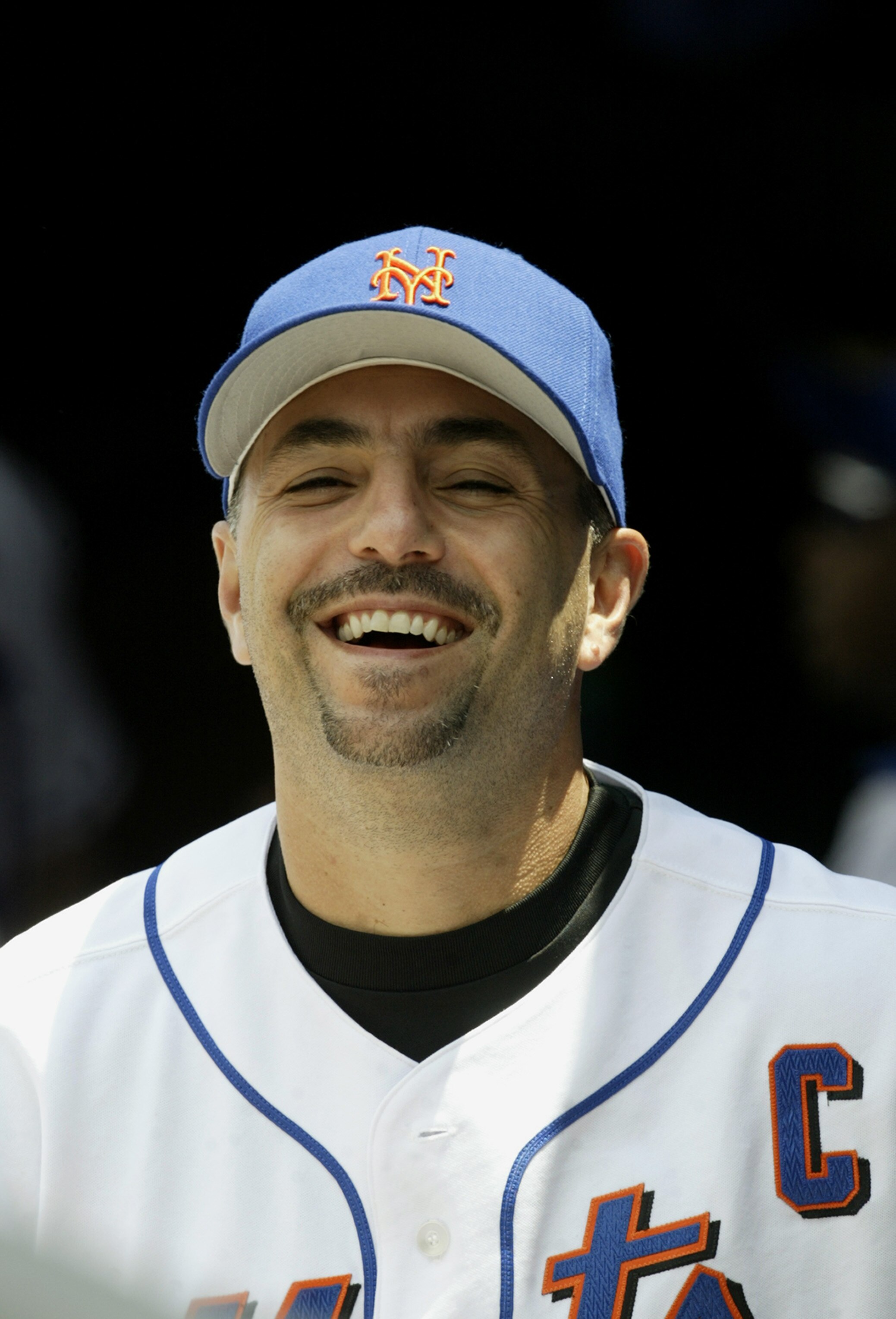 FLUSHING, NY - JULY 12:  John Franco #45 of the New York Mets laughs before the game against the Philadelphia Phillies on July 12, 2003 at Shea Stadium in Flushing, New York.  The Phillies defeated the Mets in 11 innings 4-2.  (Photo by Chris Trotman/Gett