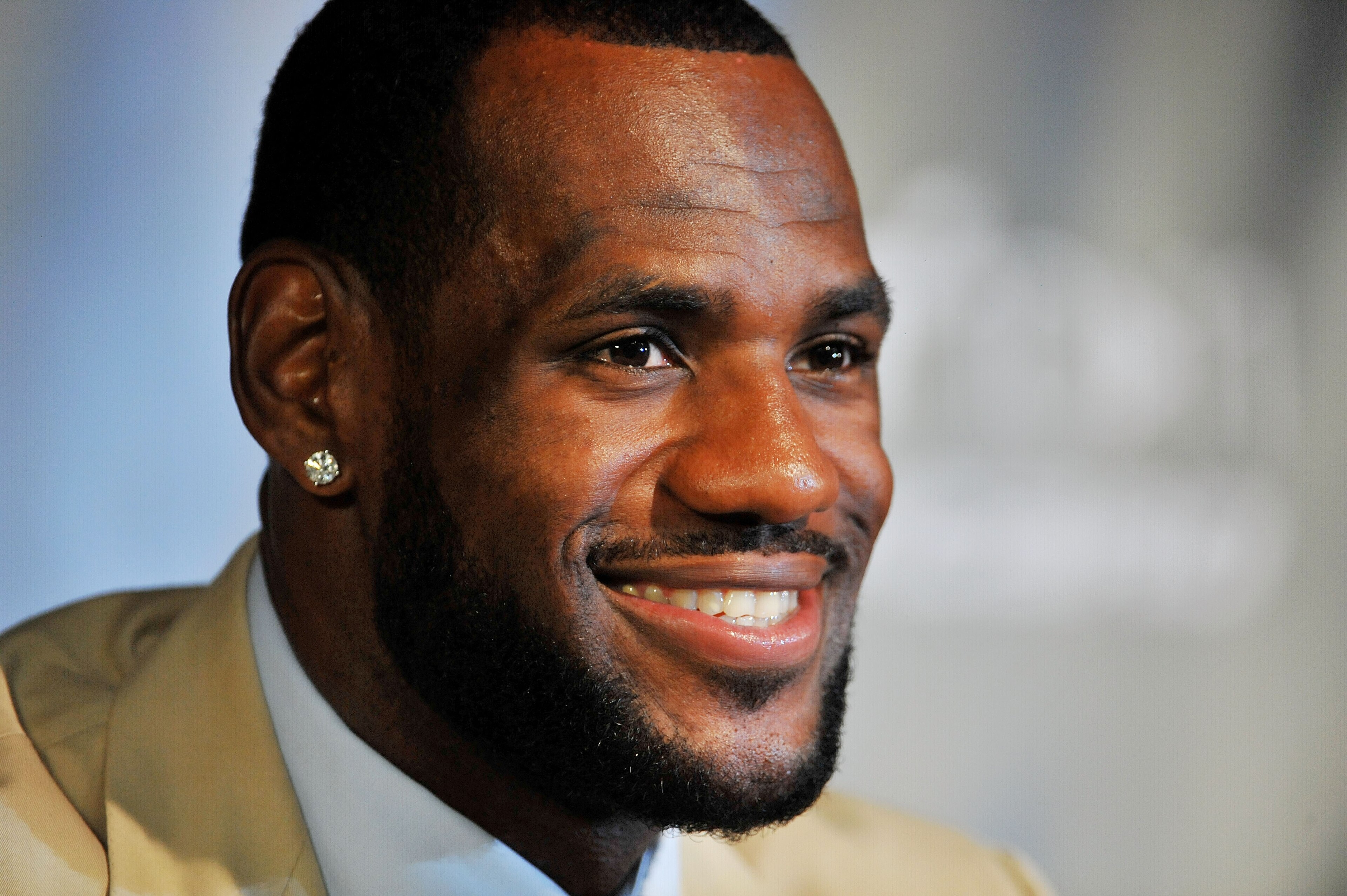 MIAMI - JULY 09: LeBron James #6, of the Miami Heat smiles during a press conference after a welcome party at American Airlines Arena on July 9, 2010 in Miami, Florida. (Photo by Doug Benc/Getty Images) MIAMI - JULY 09: LeBron James #6, of the Miami Heat smiles during a press conference after a welcome party at American Airlines Arena on July 9, 2010 in Miami, Florida. (Photo by Doug Benc/Getty Images)