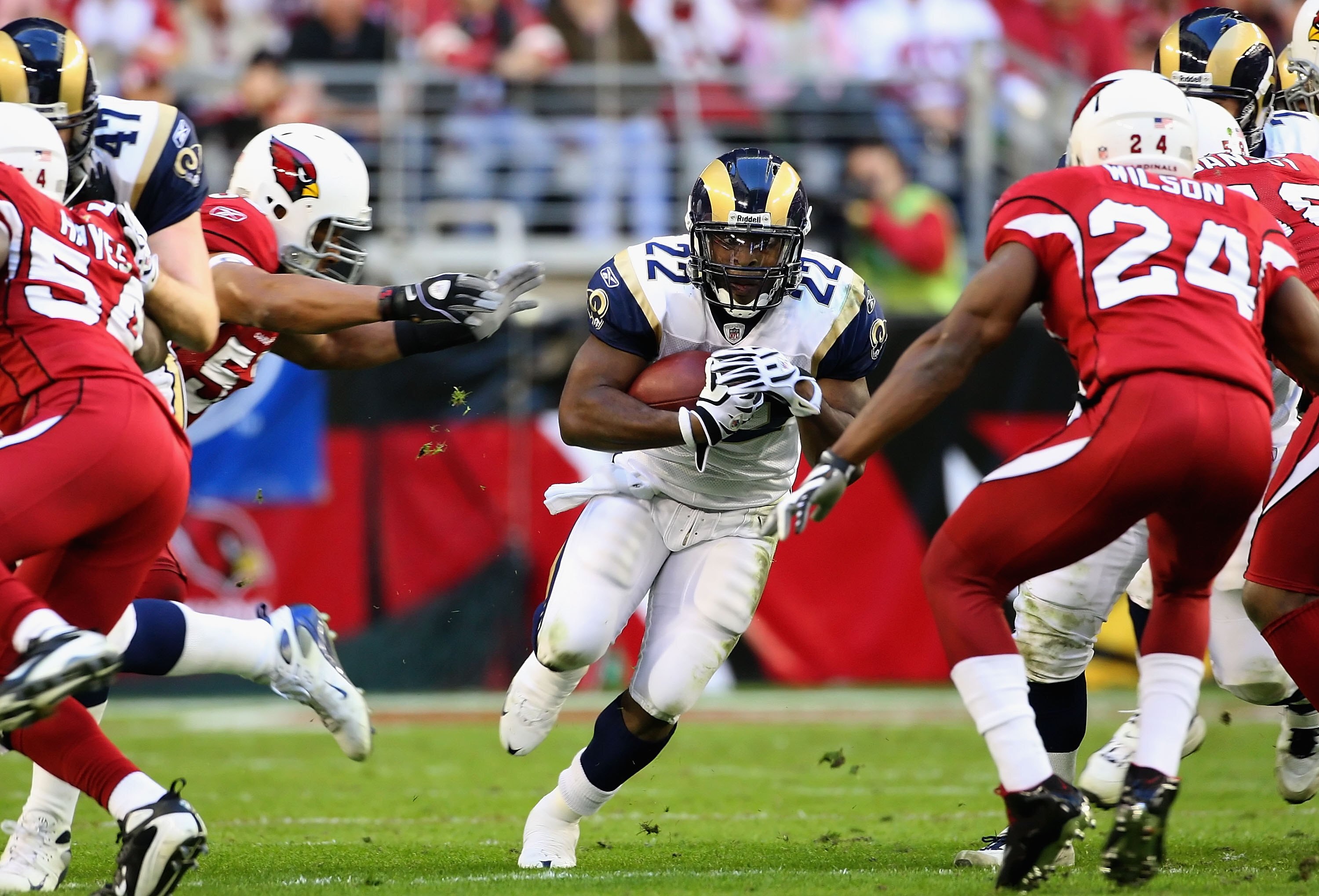 GLENDALE, AZ - DECEMBER 27:  Runningback Chris Ogbonnaya #22 of the St. Louis Rams rushes the ball against the Arizona Cardinals during the third quarter of the NFL game at the Universtity of Phoenix Stadium on December 27, 2009 in Glendale, Arizona. The 