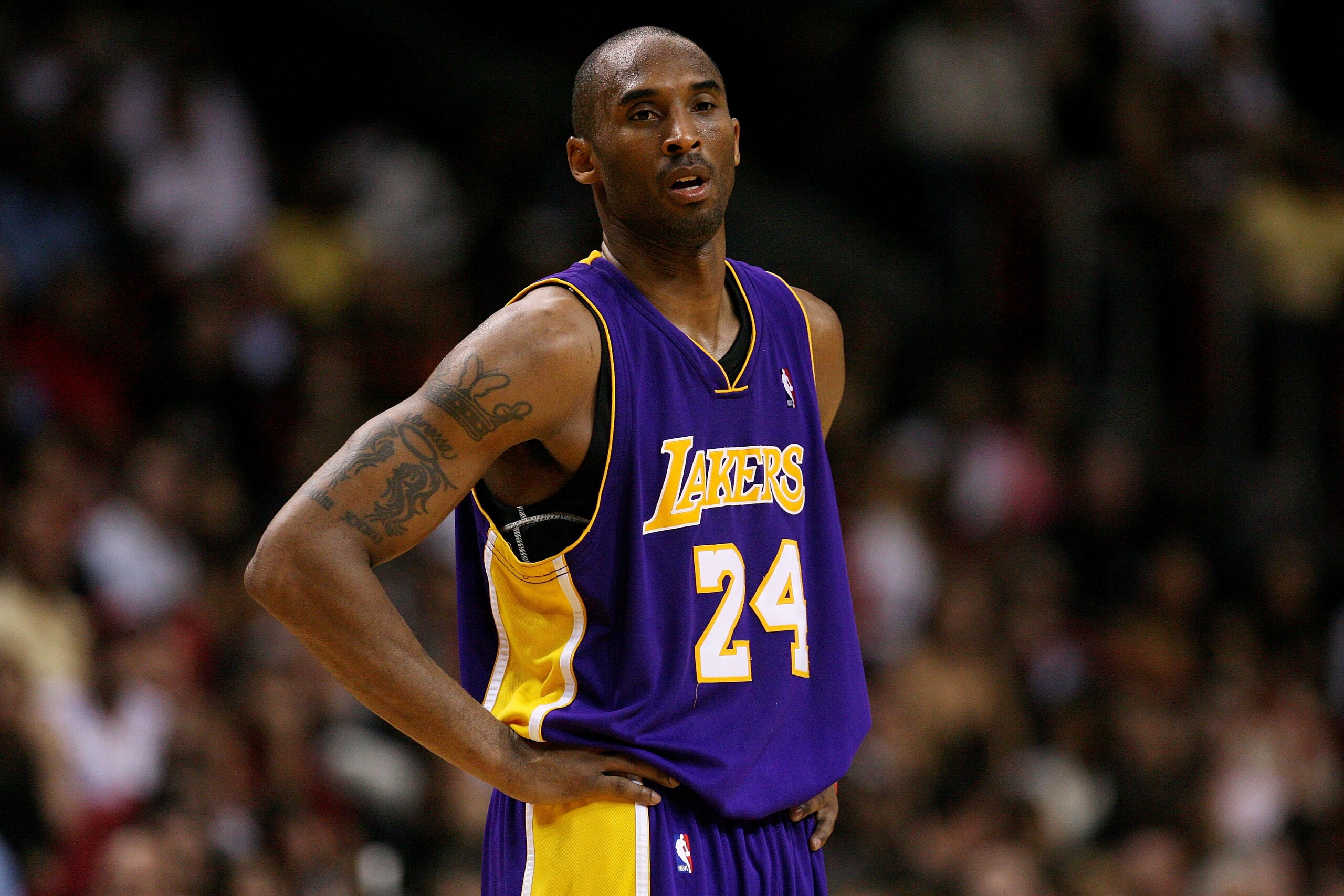 MIAMI - DECEMBER 19:  Kobe Bryant #24 of the Los Angeles Lakers watches as Dwyane Wade #3 of the Miami Heat shoots free-throws in the fourth quarter at American Airlines Arena on December 19, 2008 in Miami, Florida. The Heat defeated the Lakers 89-87. NOT