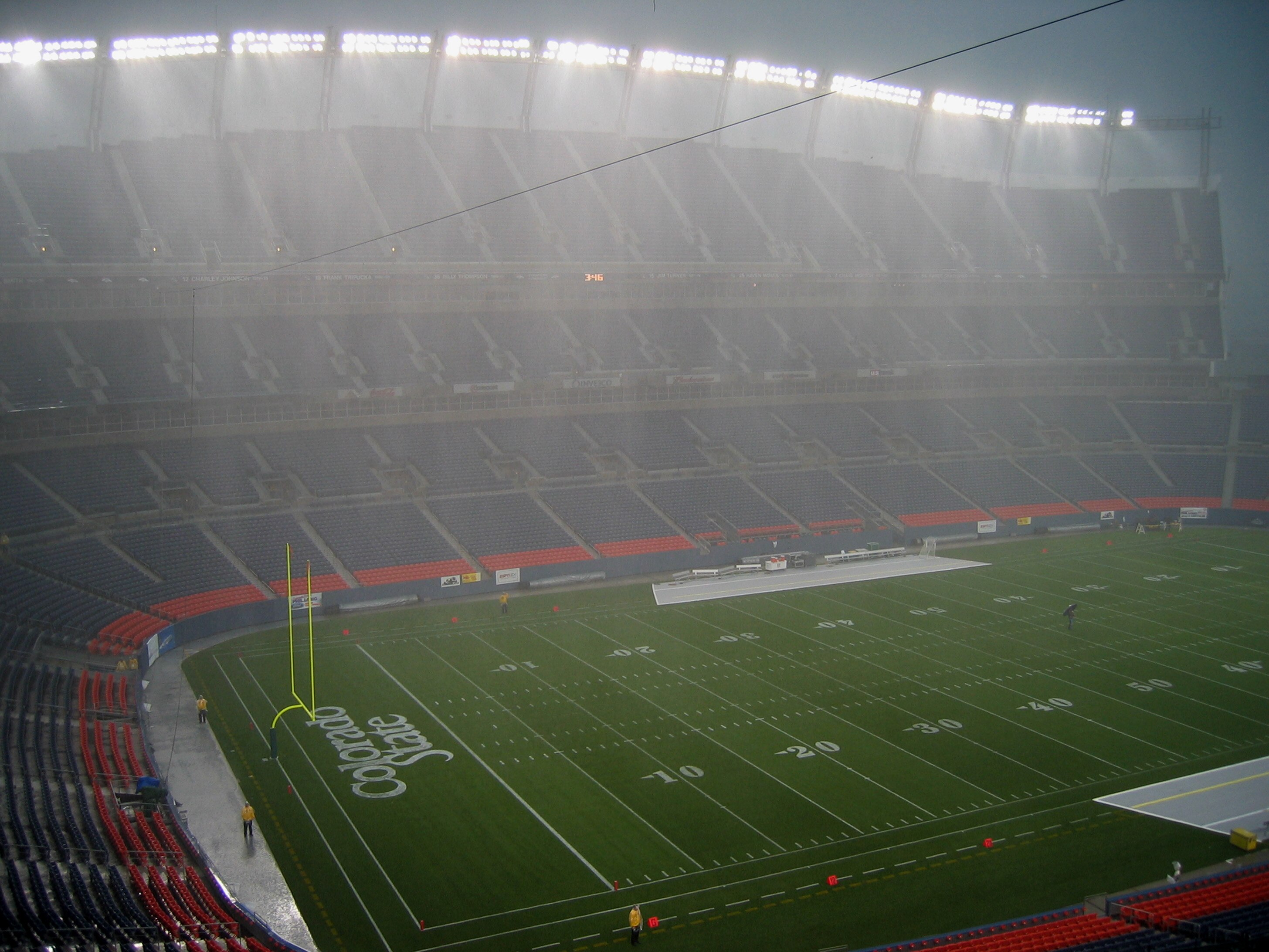 DENVER - AUGUST 30:  Rain sheets down before a game between the University of Colorado Buffaloes and the Colorado State University Rams at Invesco Field at Mile High on August 30, 2003 in Denver, Colorado. Colorado defeated Colorado State 42-35. (Photo by
