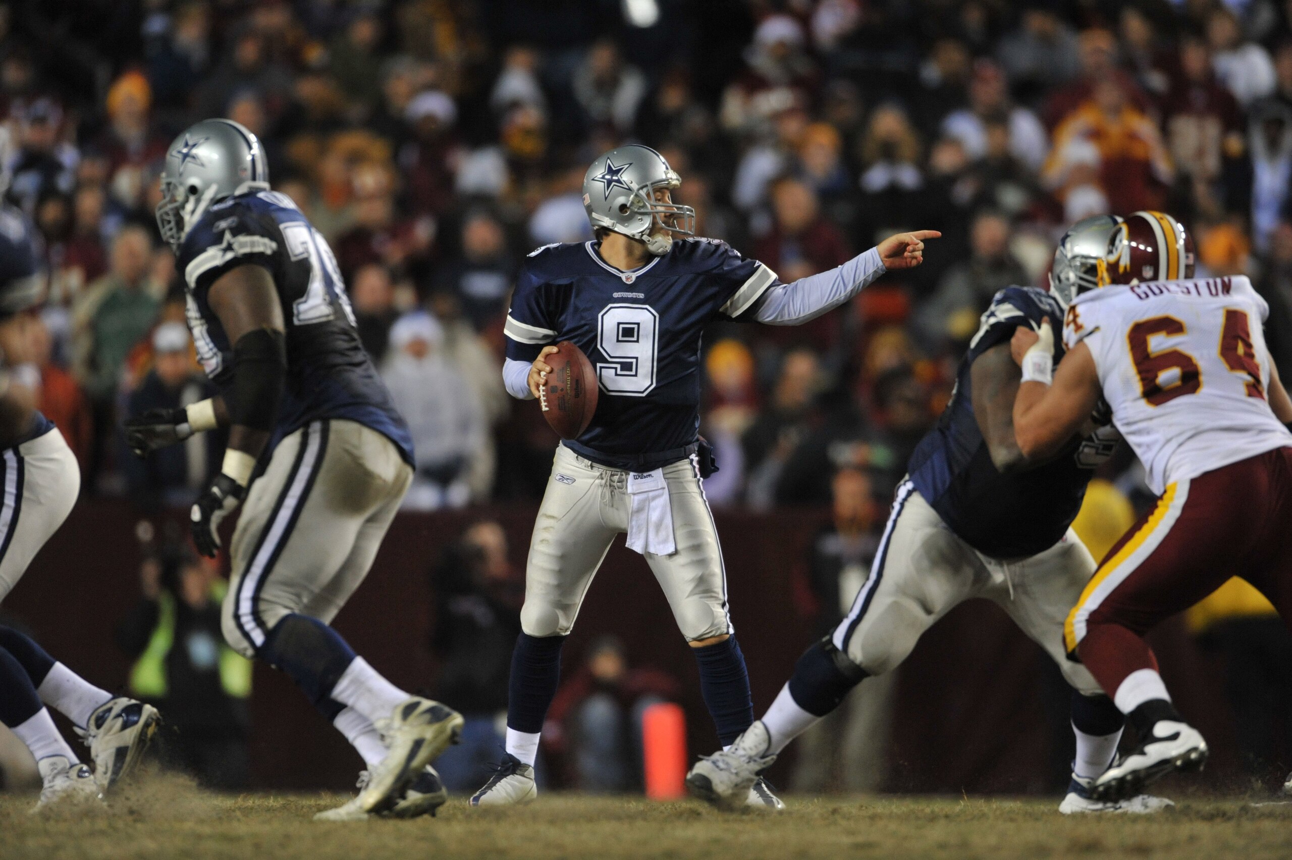 LANDOVER, MD - DECEMBER 27:  Tony Romo #9 of the Dallas Cowboys looks to pass during the game against the Washington Redskins at FedExField on December 27, 2009 in Landover, Maryland. The Cowboys defeated the Redskins 17-0. (Photo by Larry French/Getty Im