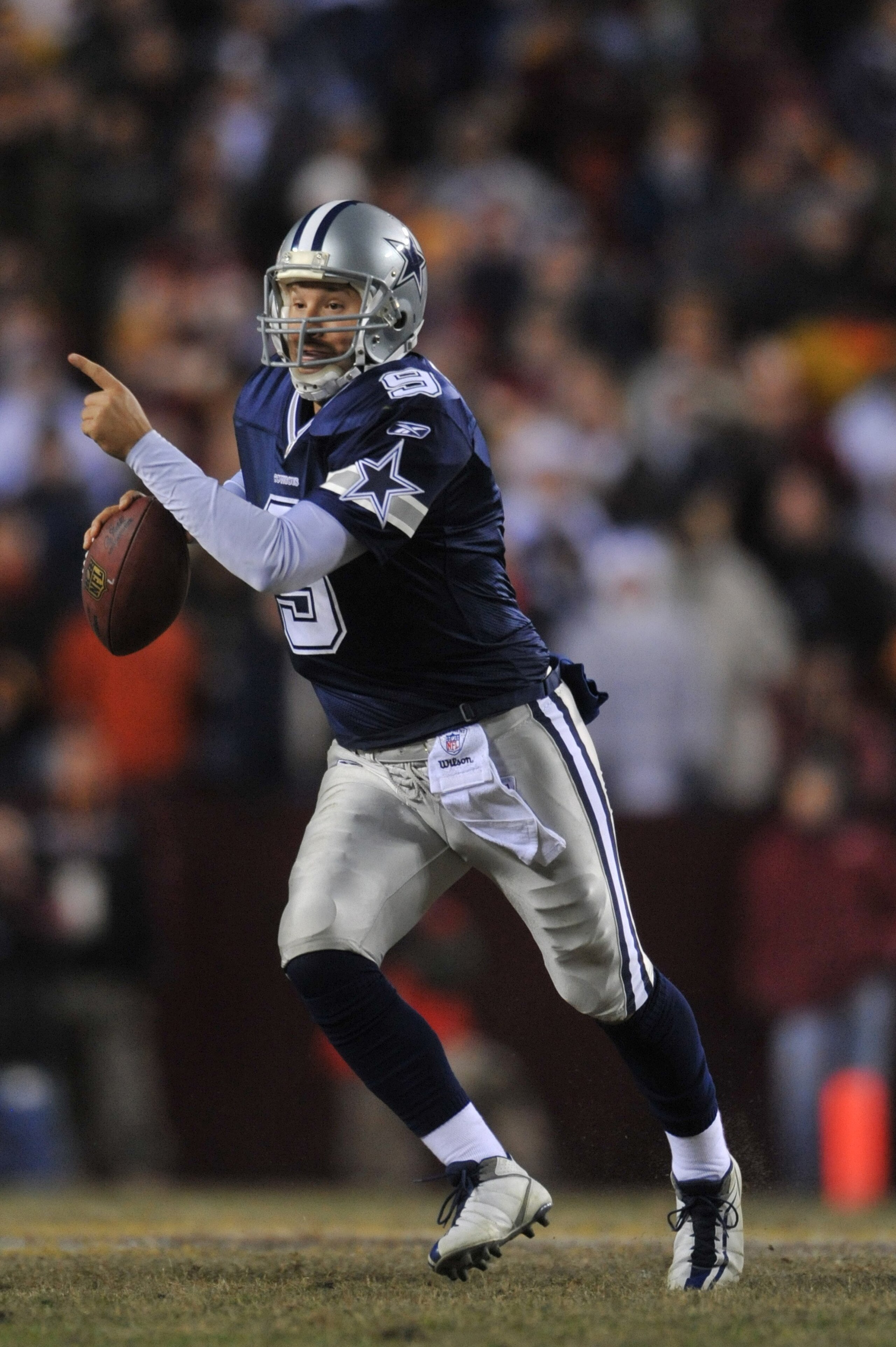 LANDOVER, MD - DECEMBER 27:  Tony Romo #9 of the Dallas Cowboys looks to pass during the game against the Washington Redskins at FedExField on December 27, 2009 in Landover, Maryland. The Cowboys defeated the Redskins 17-0. (Photo by Larry French/Getty Im