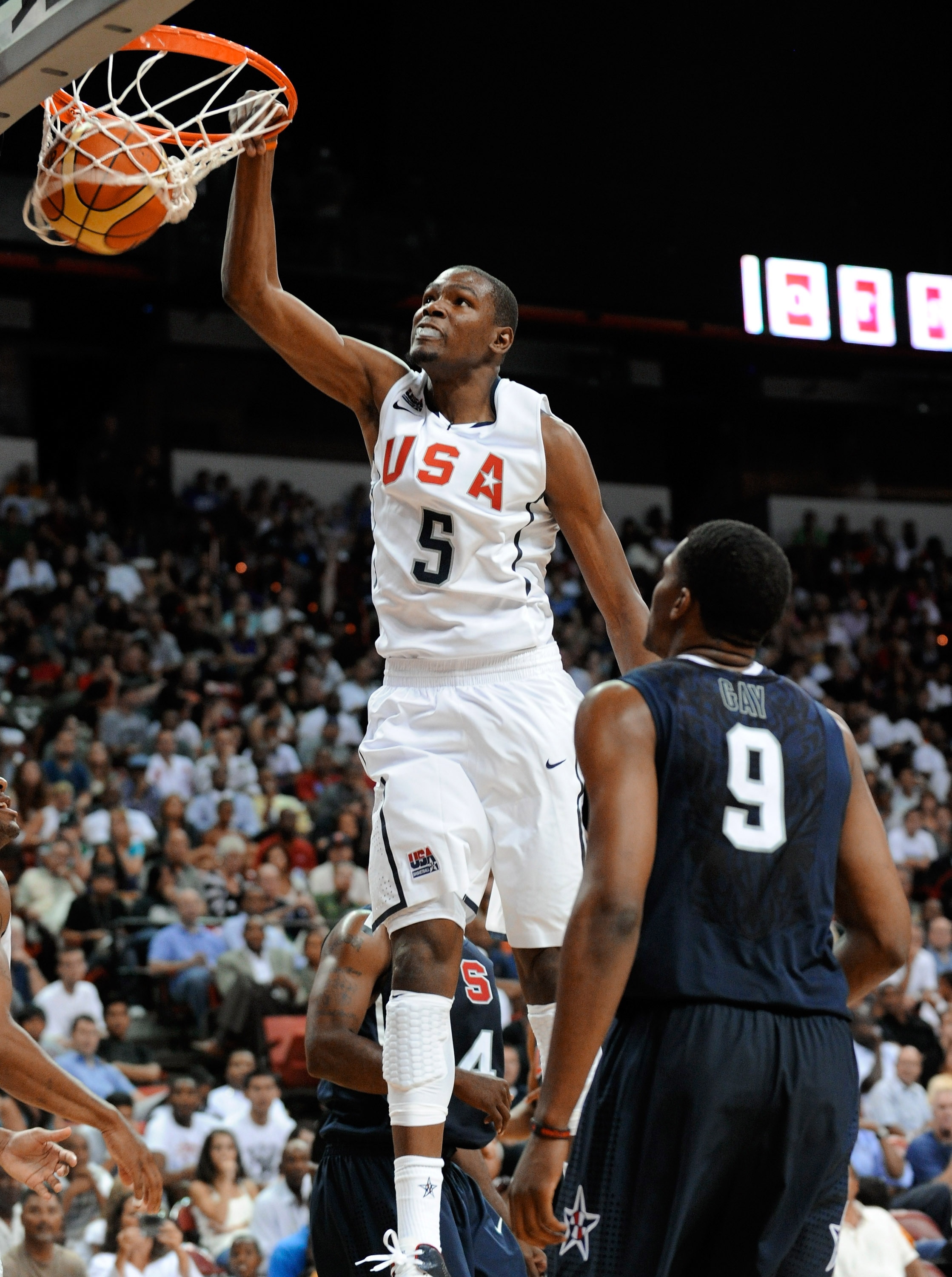 LAS VEGAS - JULY 24:  Kevin Durant #5 of the 2010 USA Basketball Men's National Team dunks over Rudy Gay #9 of the 2010 USA Basketball Men's National Team during a USA Basketball showcase at the Thomas & Mack Center on July 24, 2010 in Las Vegas, Nevada.