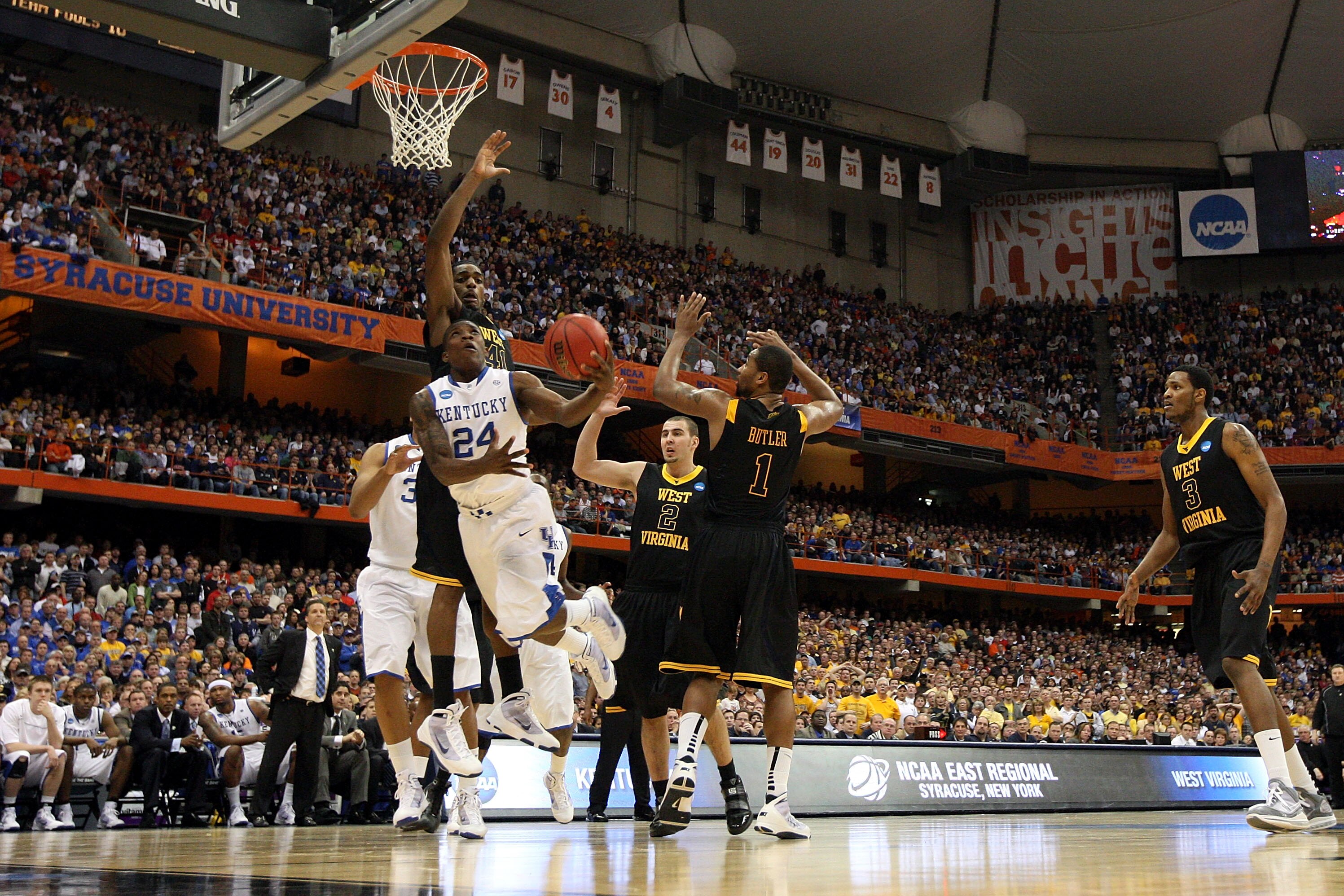SYRACUSE, NY - MARCH 27:  Eric Bledsoe #24 of the Kentucky Wildcats drives for a shot attempt against the West Virginia Mountaineers during the east regional final of the 2010 NCAA men's basketball tournament at the Carrier Dome on March 27, 2010 in Syrac