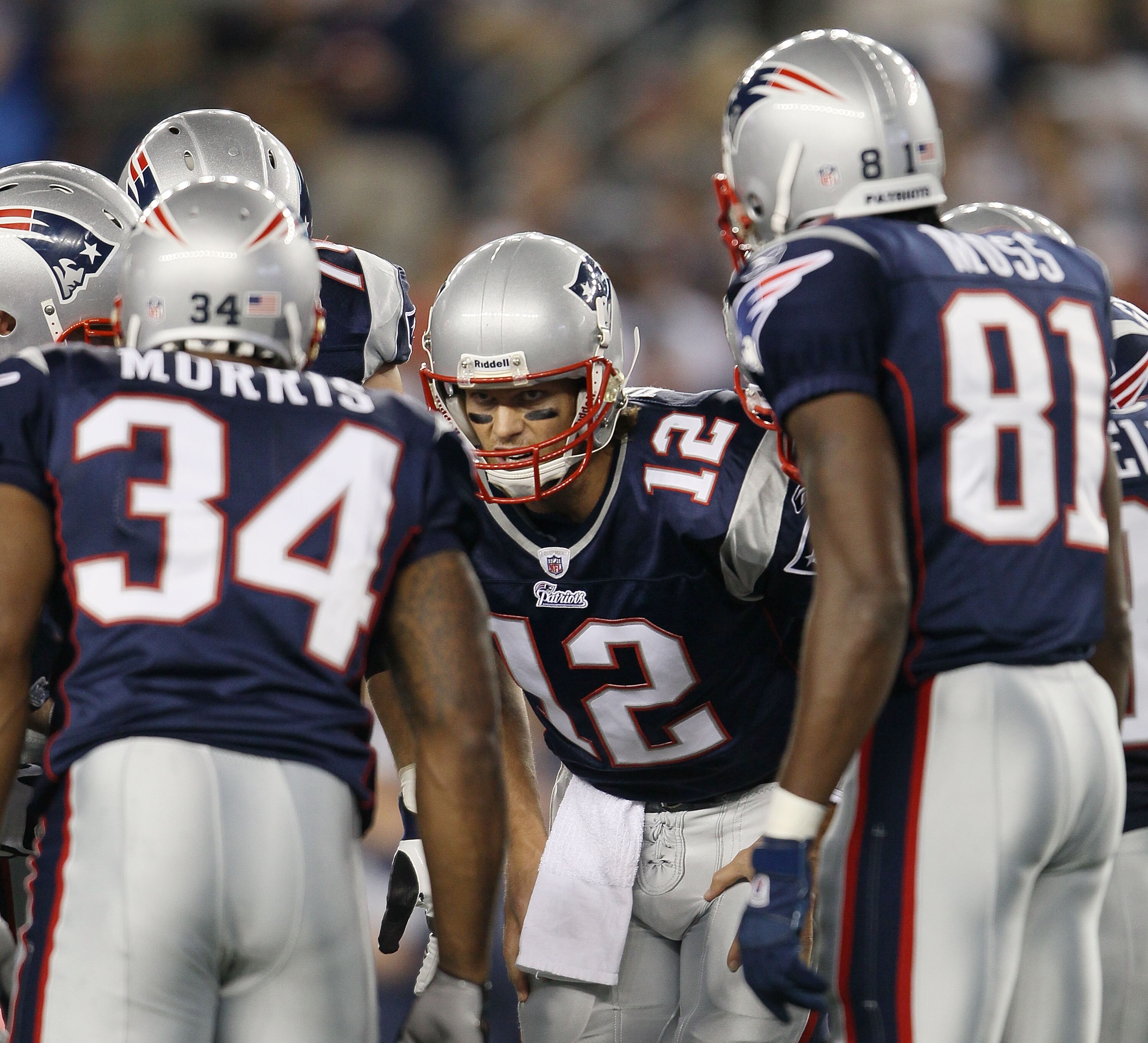 FOXBORO, MA - AUGUST 26:  Tom Brady #12 of the New England Patriots talks in the huddle in the first half against the St. Louis Rams on August 26, 2010 at Gillette Stadium in Foxboro, Massachusetts.  (Photo by Elsa/Getty Images)
