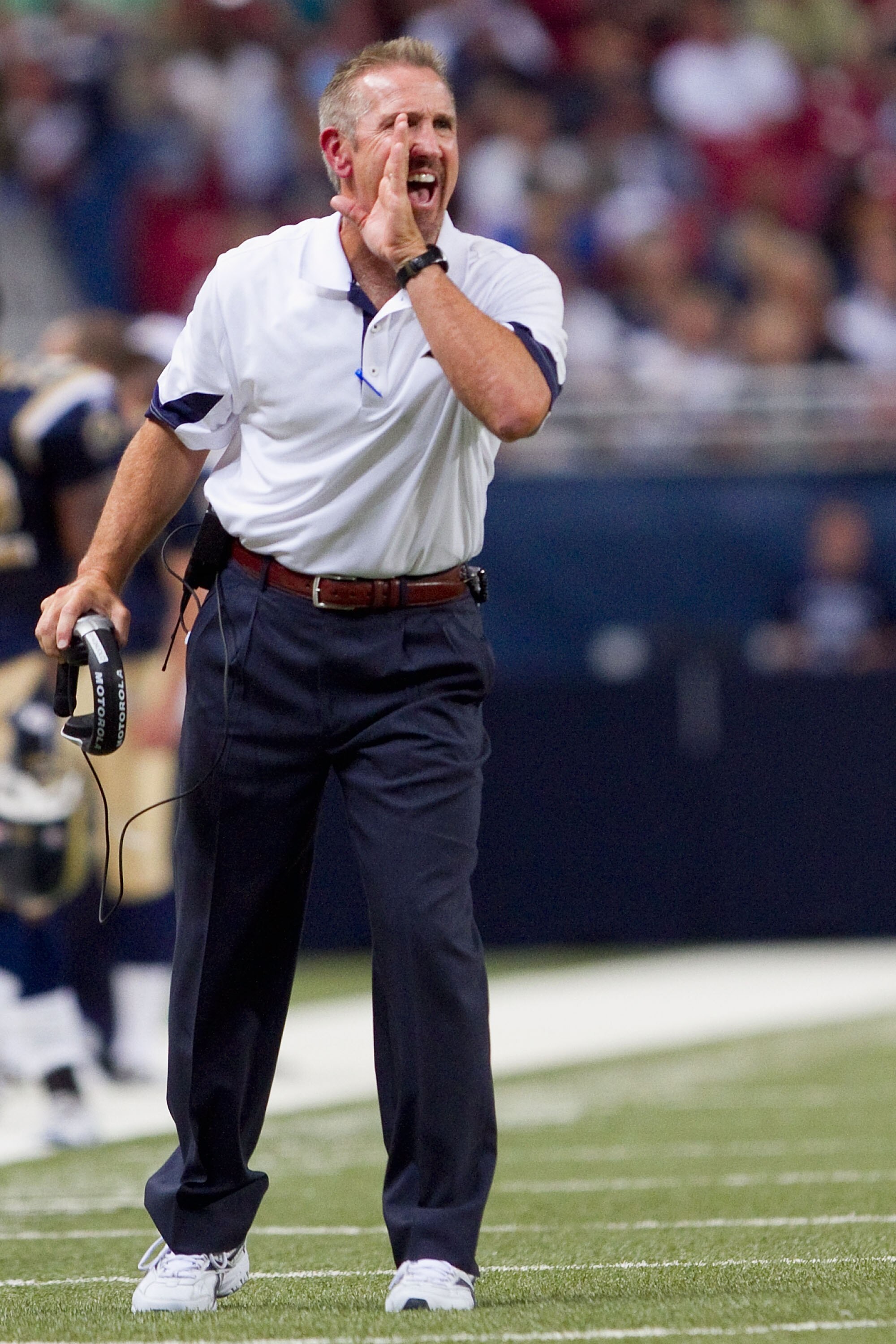 ST. LOUIS - SEPTEMBER 2: Head coach Steve Spagnuolo of the St. Louis Rams calls to his team during a timeout against the Baltimore Ravens during an NFL preseason game at the Edward Jones Dome on September 2, 2010 in St. Louis, Missouri.  (Photo by Dilip V