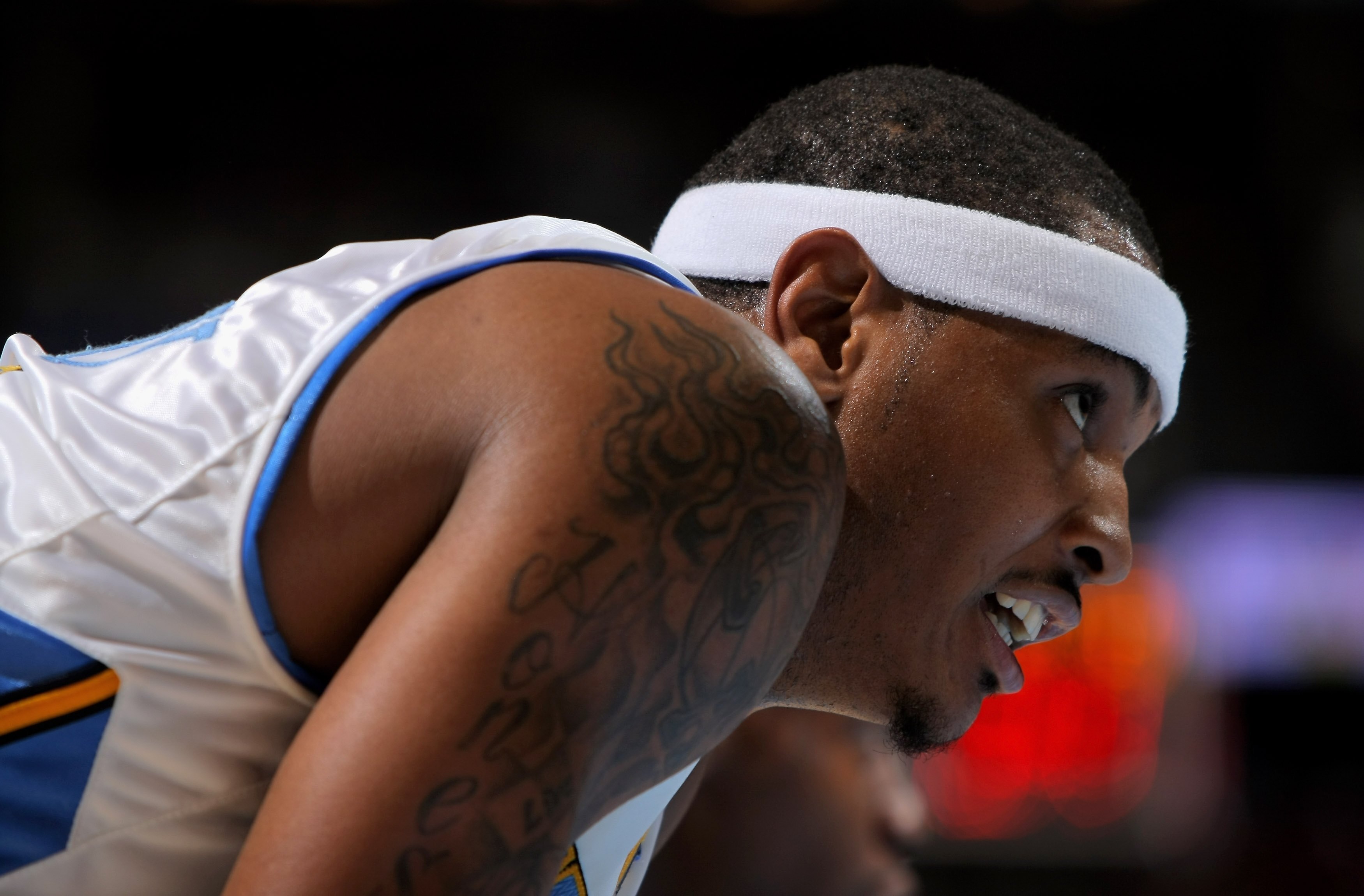 DENVER - OCTOBER 28:  Carmelo Anthony #15 of the Denver Nuggets looks on while awaiting a free throw against the Utah Jazz during NBA action at Pepsi Center on October 28, 2009 in Denver, Colorado. The Nuggets defeated the Jazz 114-105.  (Photo by Doug Pe