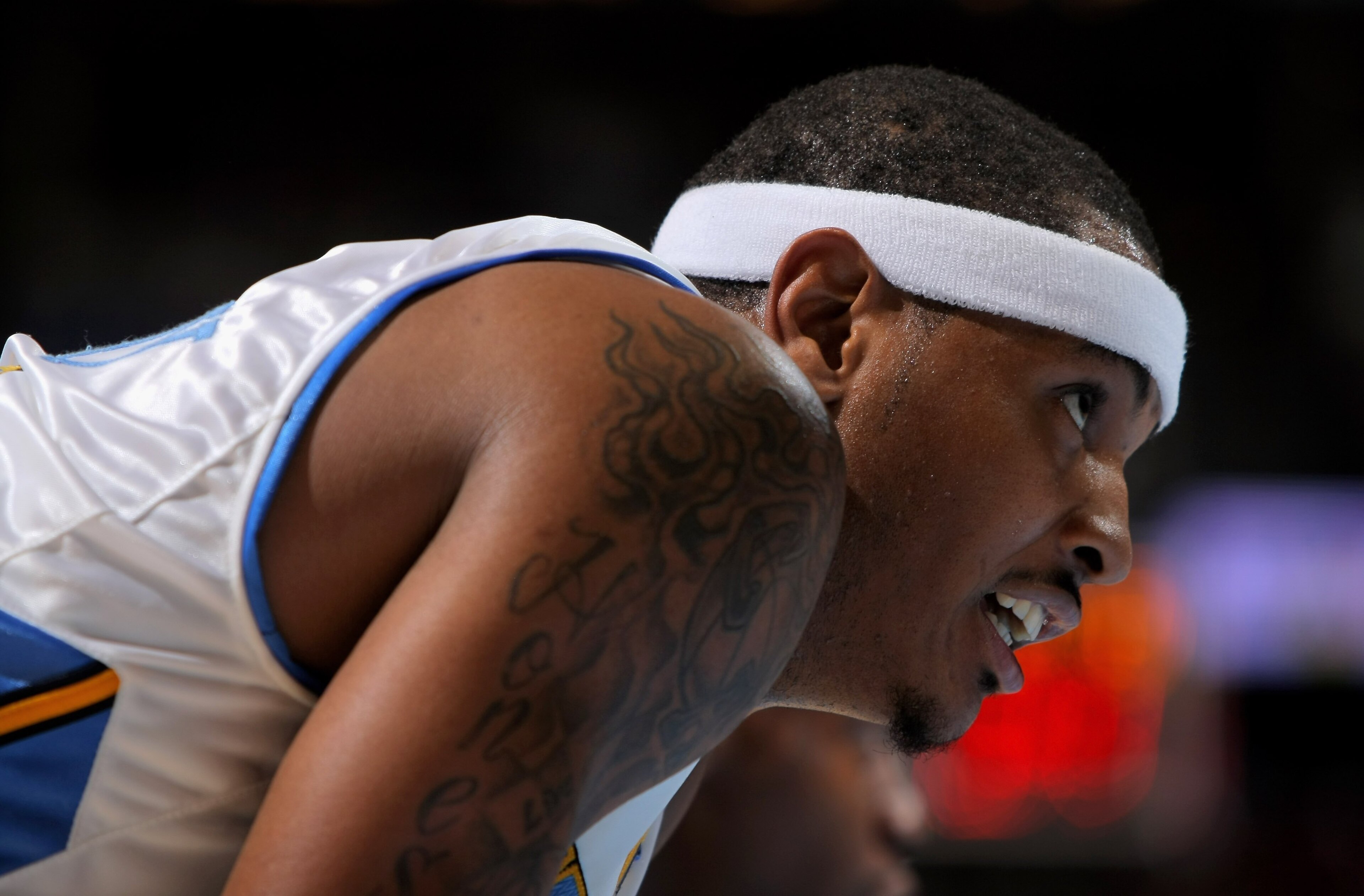 DENVER - OCTOBER 28:  Carmelo Anthony #15 of the Denver Nuggets looks on while awaiting a free throw against the Utah Jazz during NBA action at Pepsi Center on October 28, 2009 in Denver, Colorado. The Nuggets defeated the Jazz 114-105.  (Photo by Doug Pe