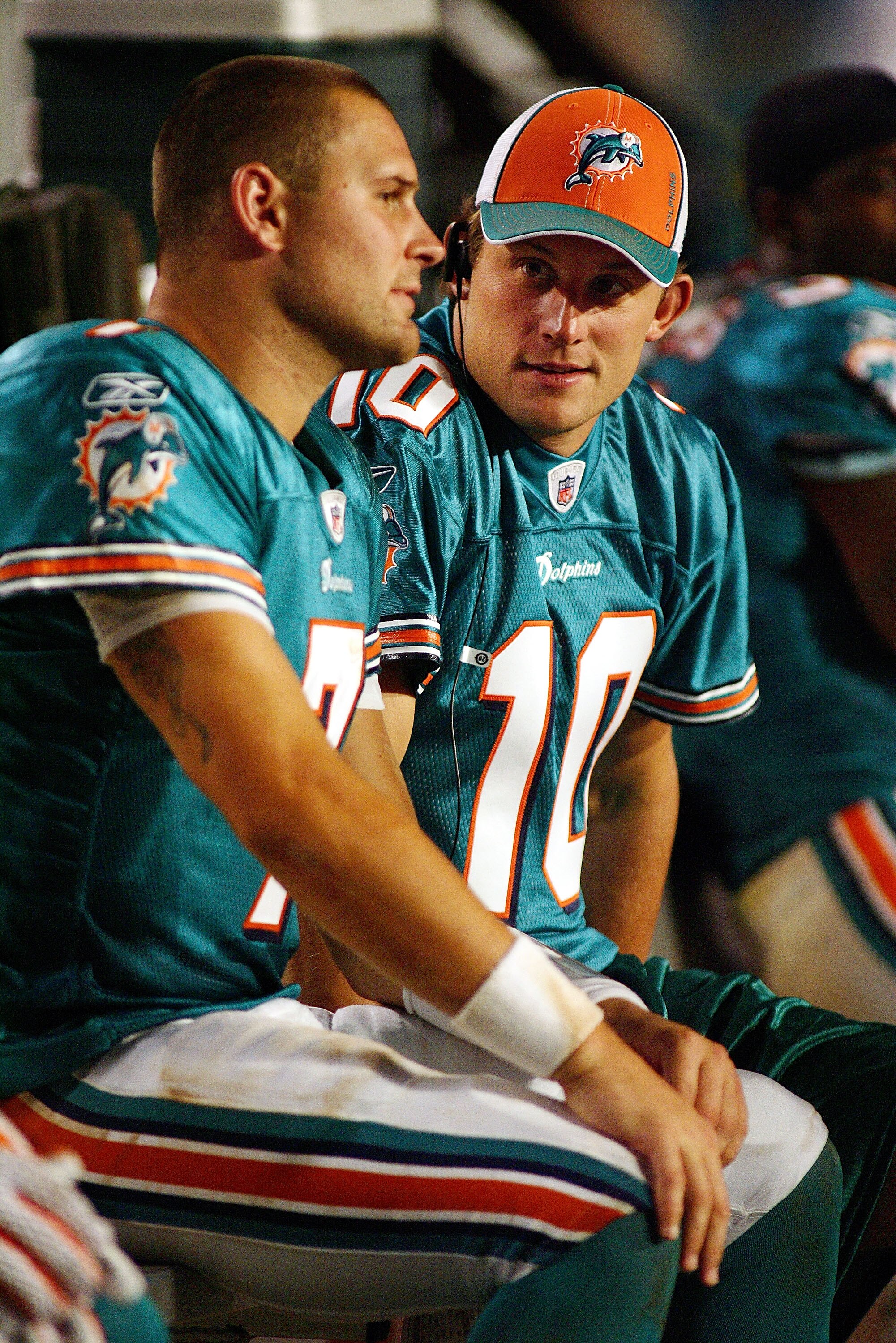 MIAMI - AUGUST 09:  Quarterback Chad Pennington #10 of the Miami Dolphins sits with quarterback Chad Henne #7 during a pre season game against the Tampa Bay Buccaneers August 9, 2008 at Dolphin Stadium in Miami, Florida.  (Photo by Marc Serota/Getty Image